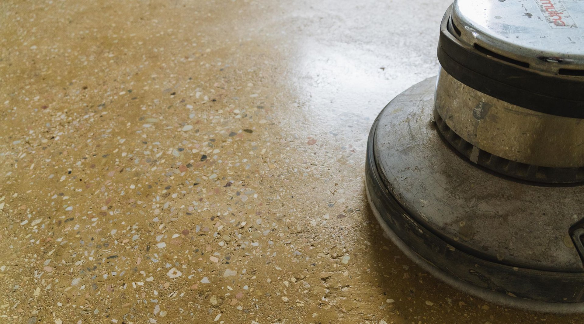 rammed earthen floor with a grinder