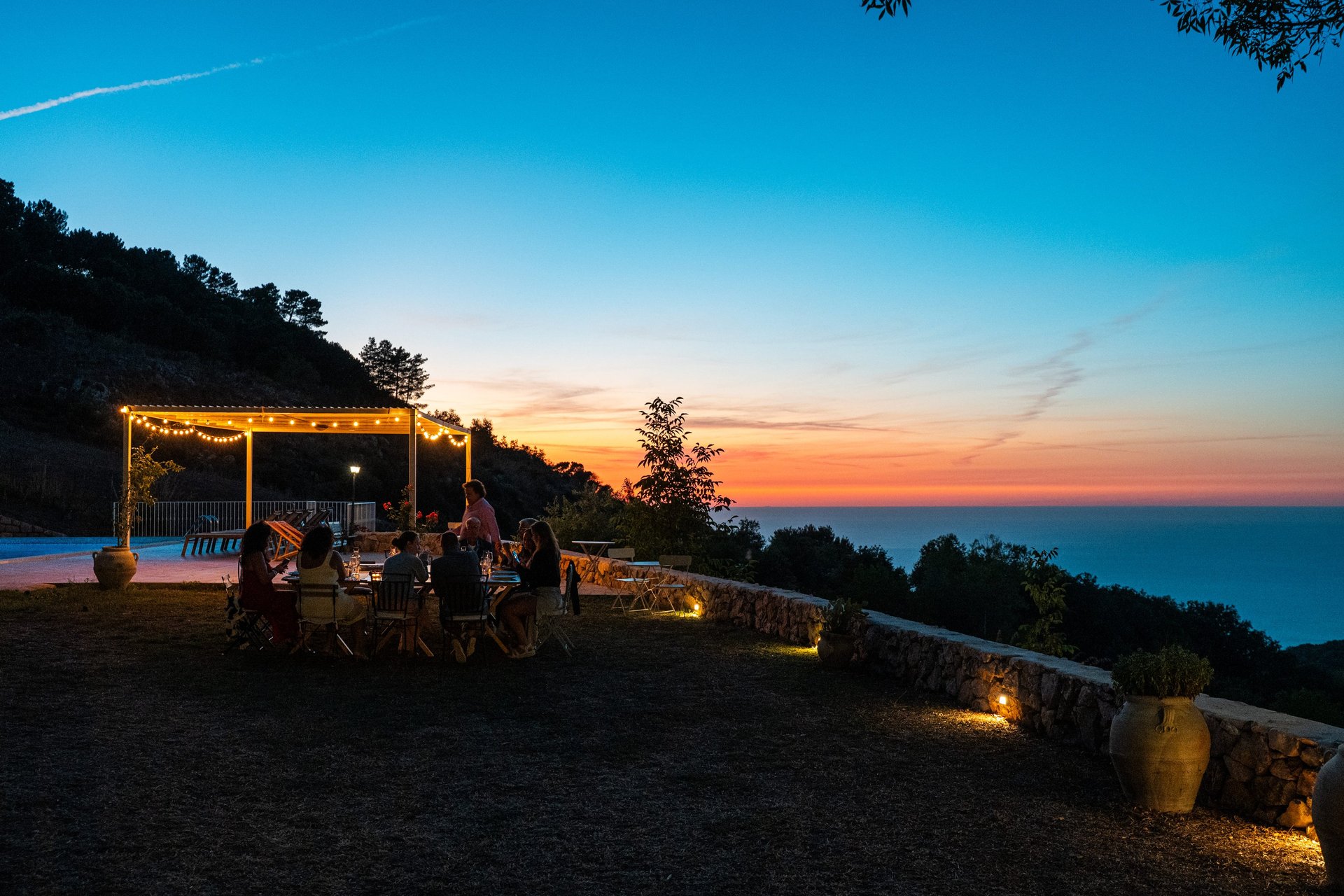 an abstract photo of a curved building with a blue sky in the background