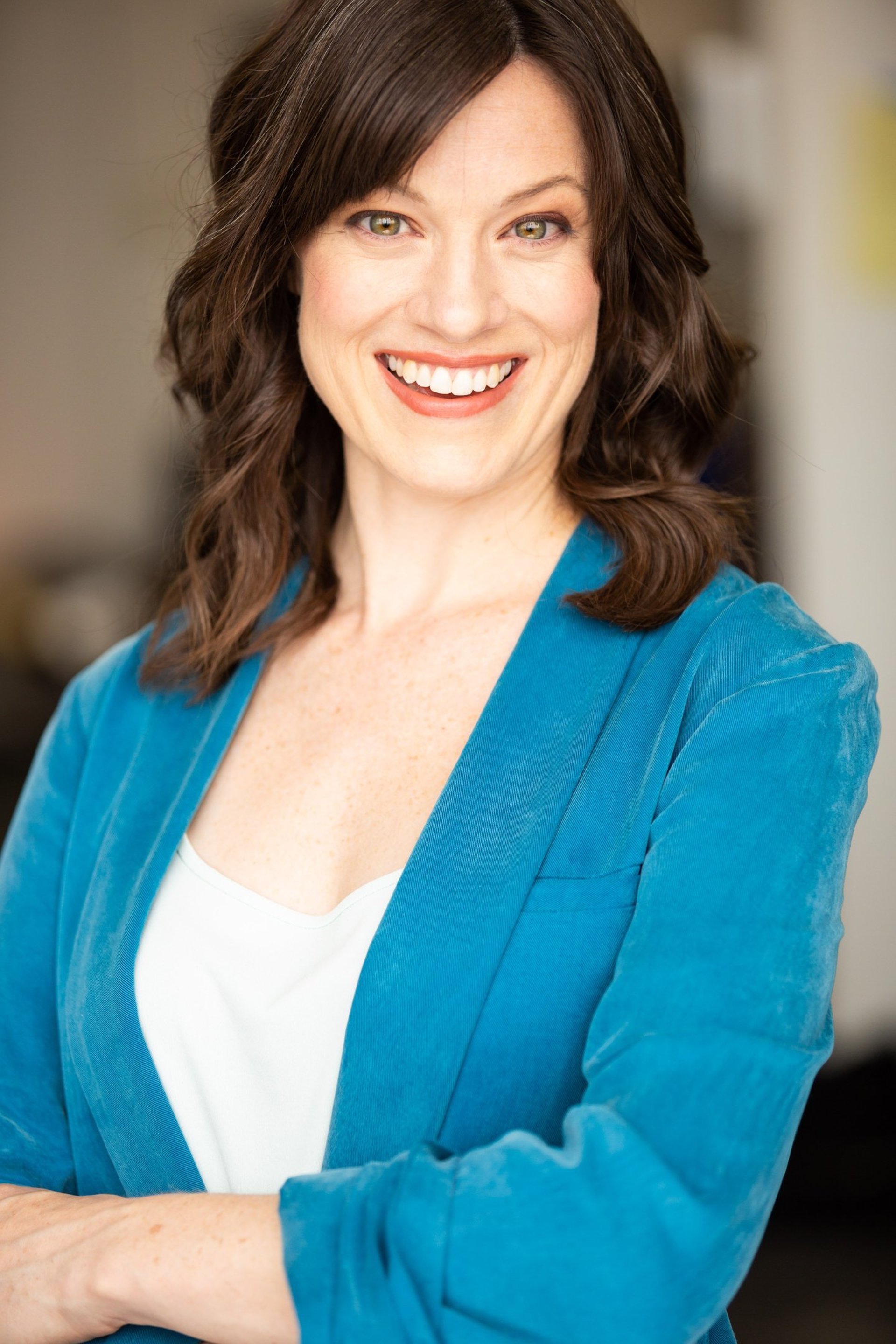 an abstract photo of a curved building with a blue sky in the background