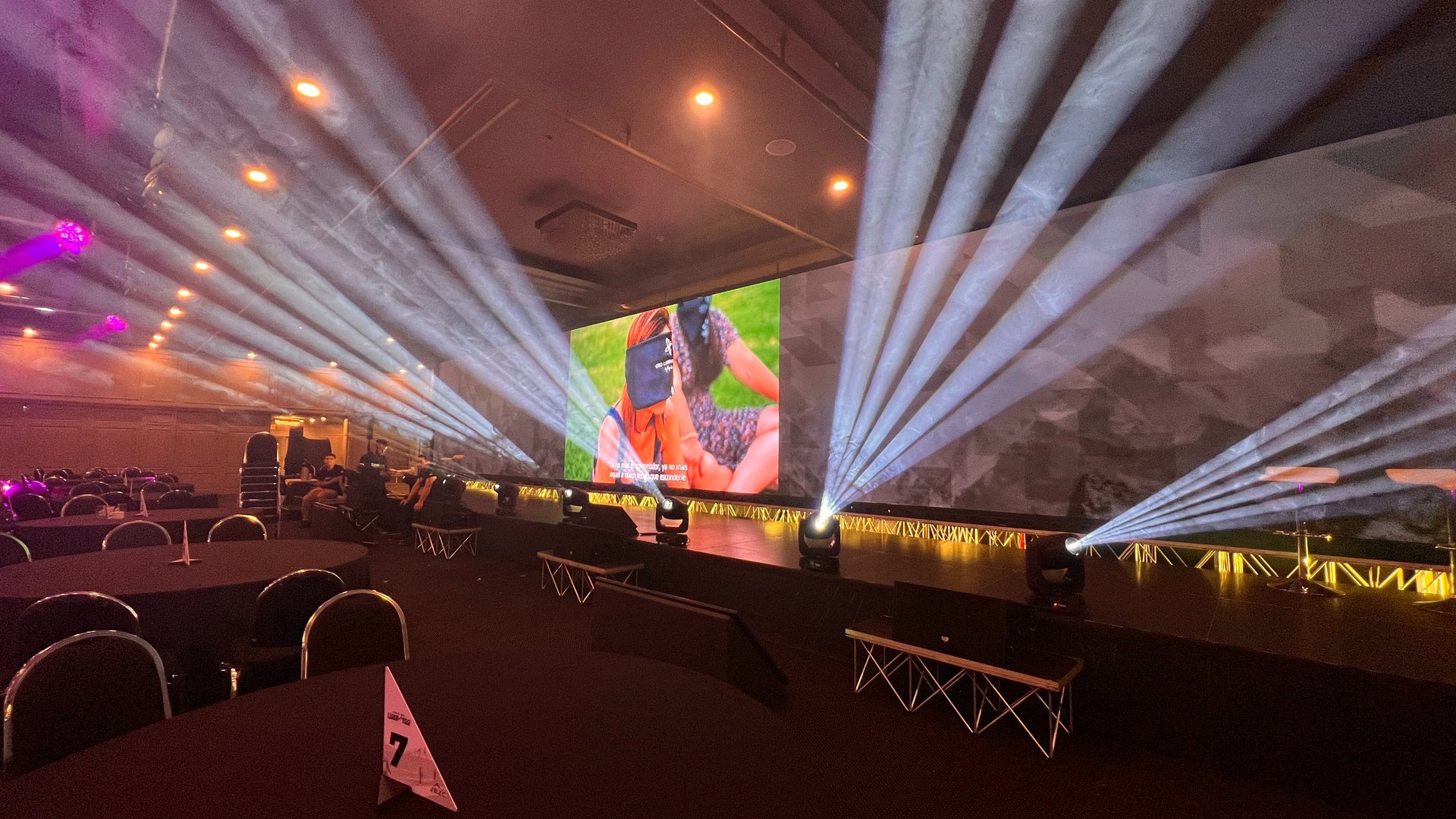 an abstract photo of a curved building with a blue sky in the background