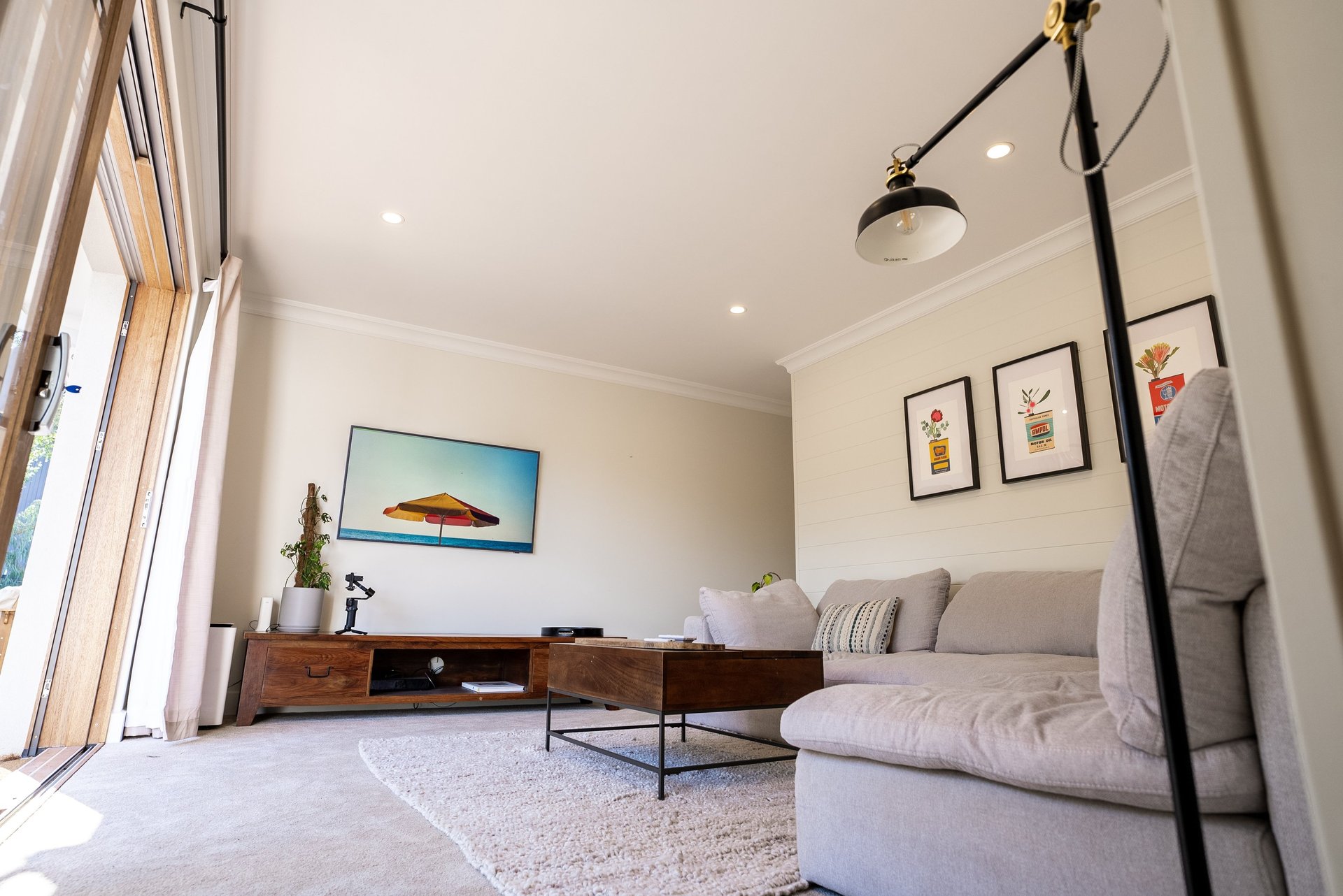 woman wearing yellow long-sleeved dress under white clouds and blue sky during daytime