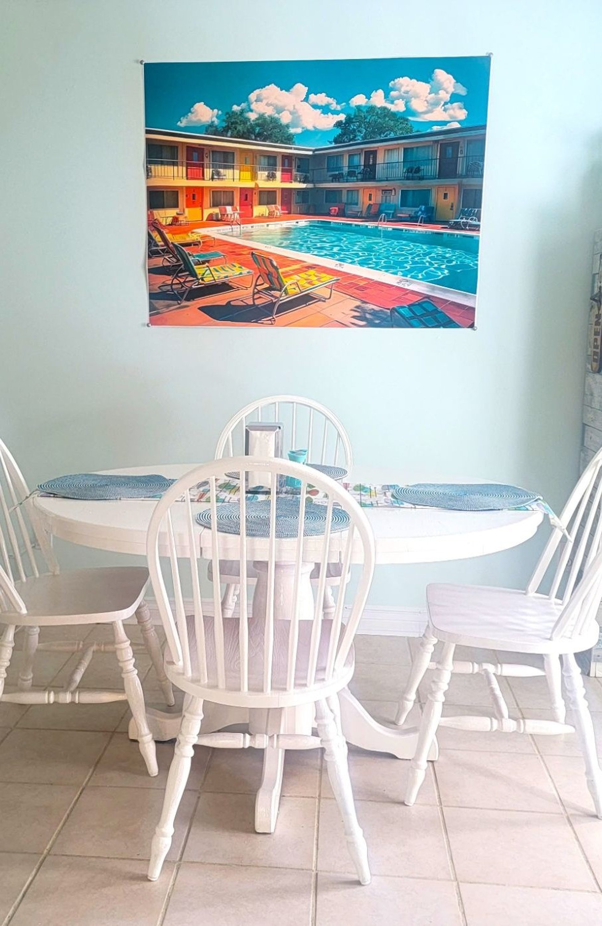 woman wearing yellow long-sleeved dress under white clouds and blue sky during daytime