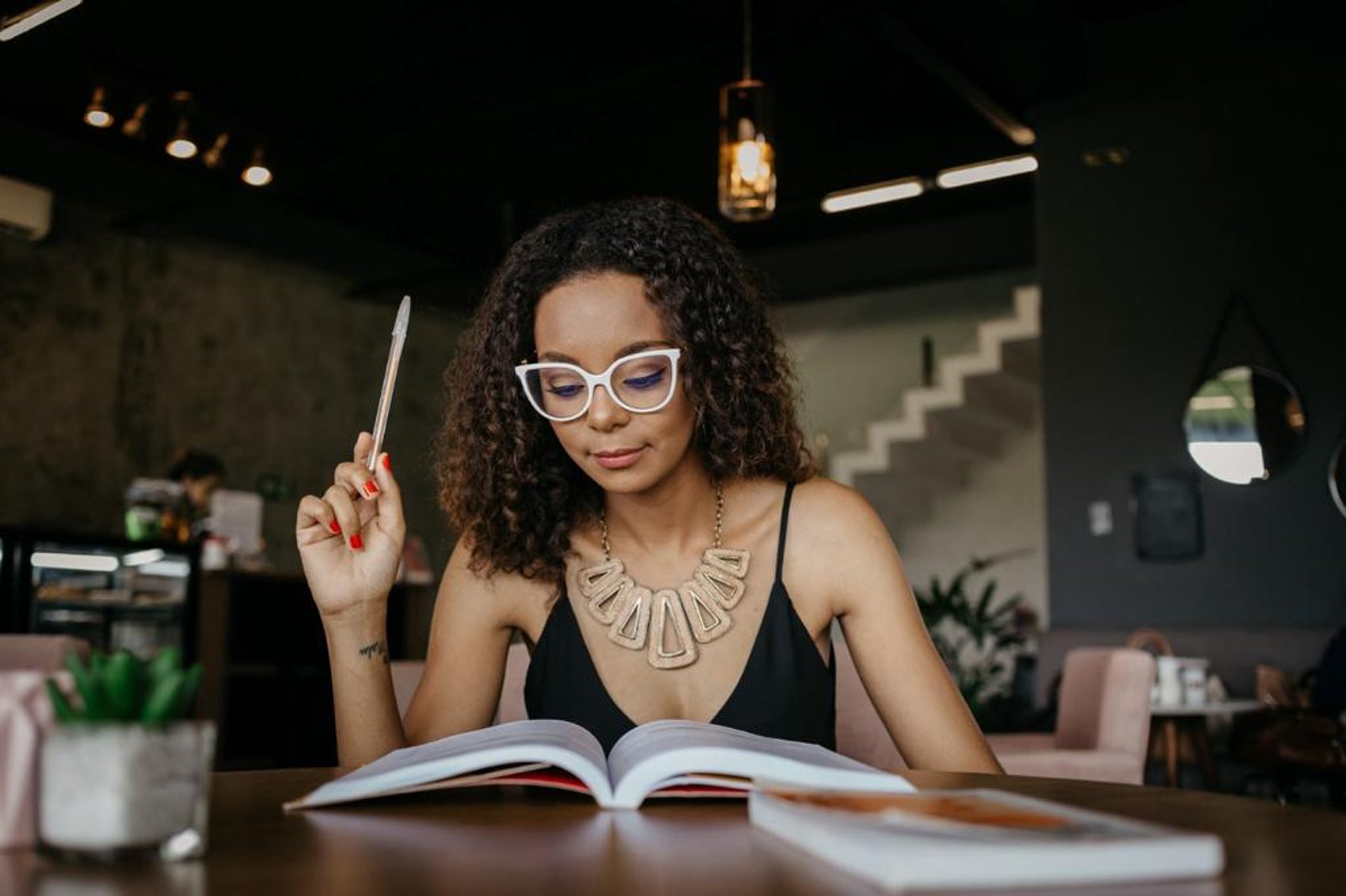 woman wearing yellow long-sleeved dress under white clouds and blue sky during daytime