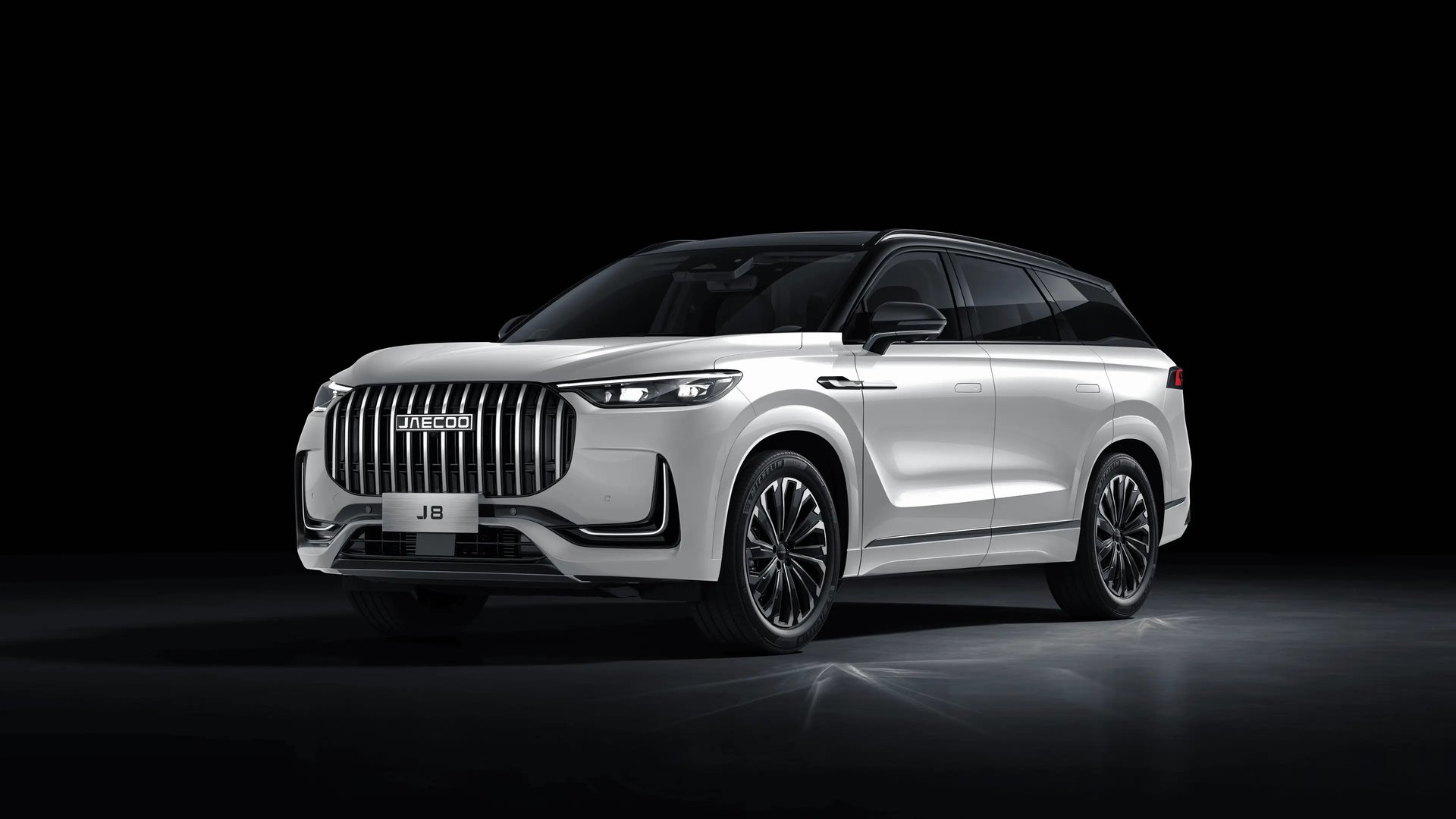 an abstract photo of a curved building with a blue sky in the background