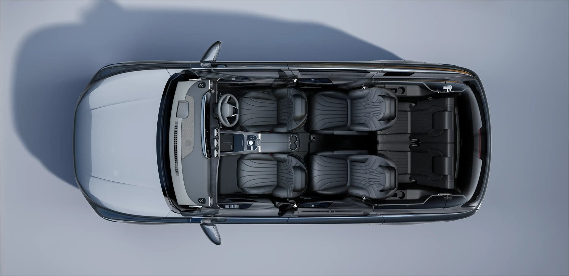 an abstract photo of a curved building with a blue sky in the background