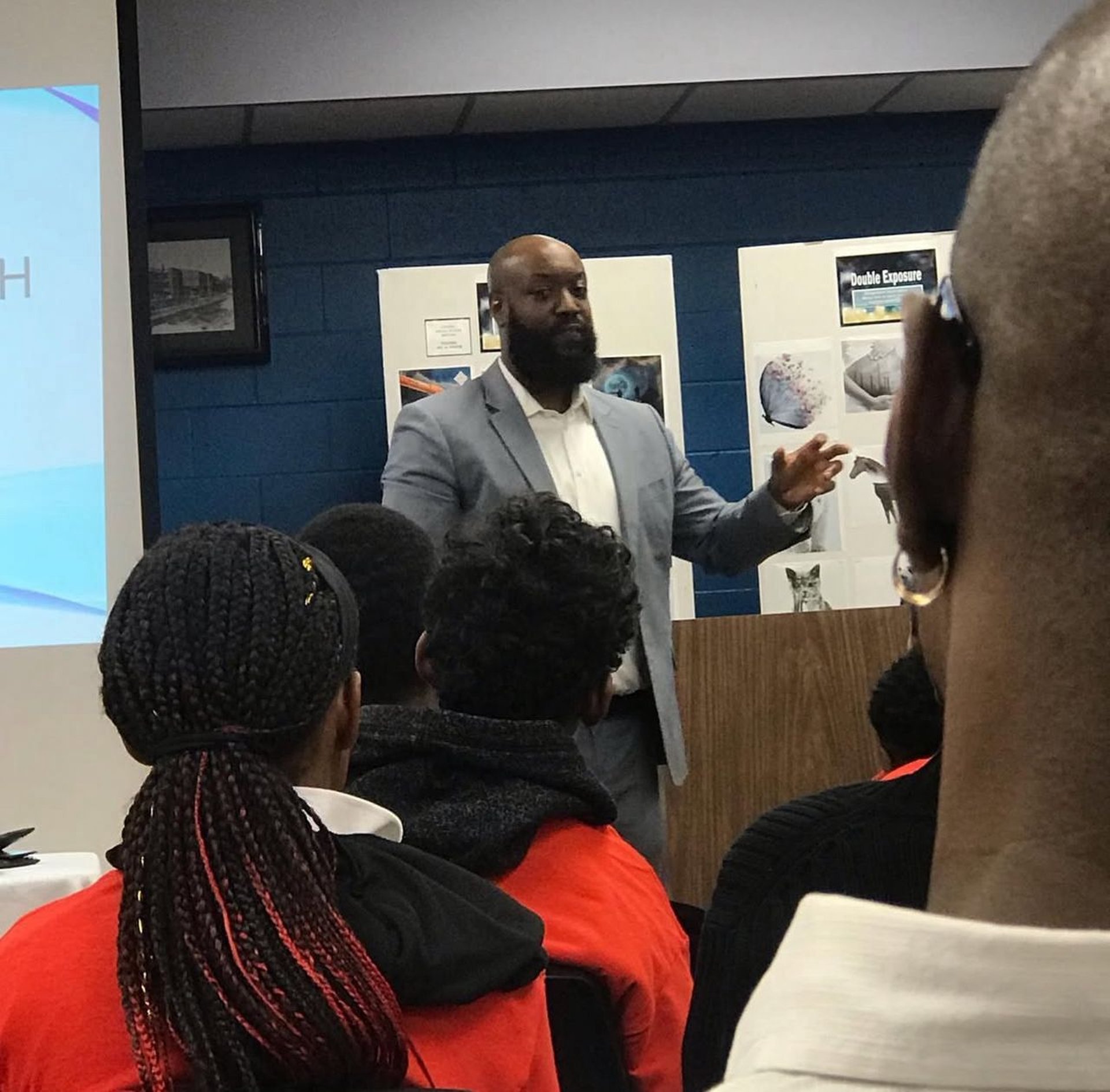 an abstract photo of a curved building with a blue sky in the background