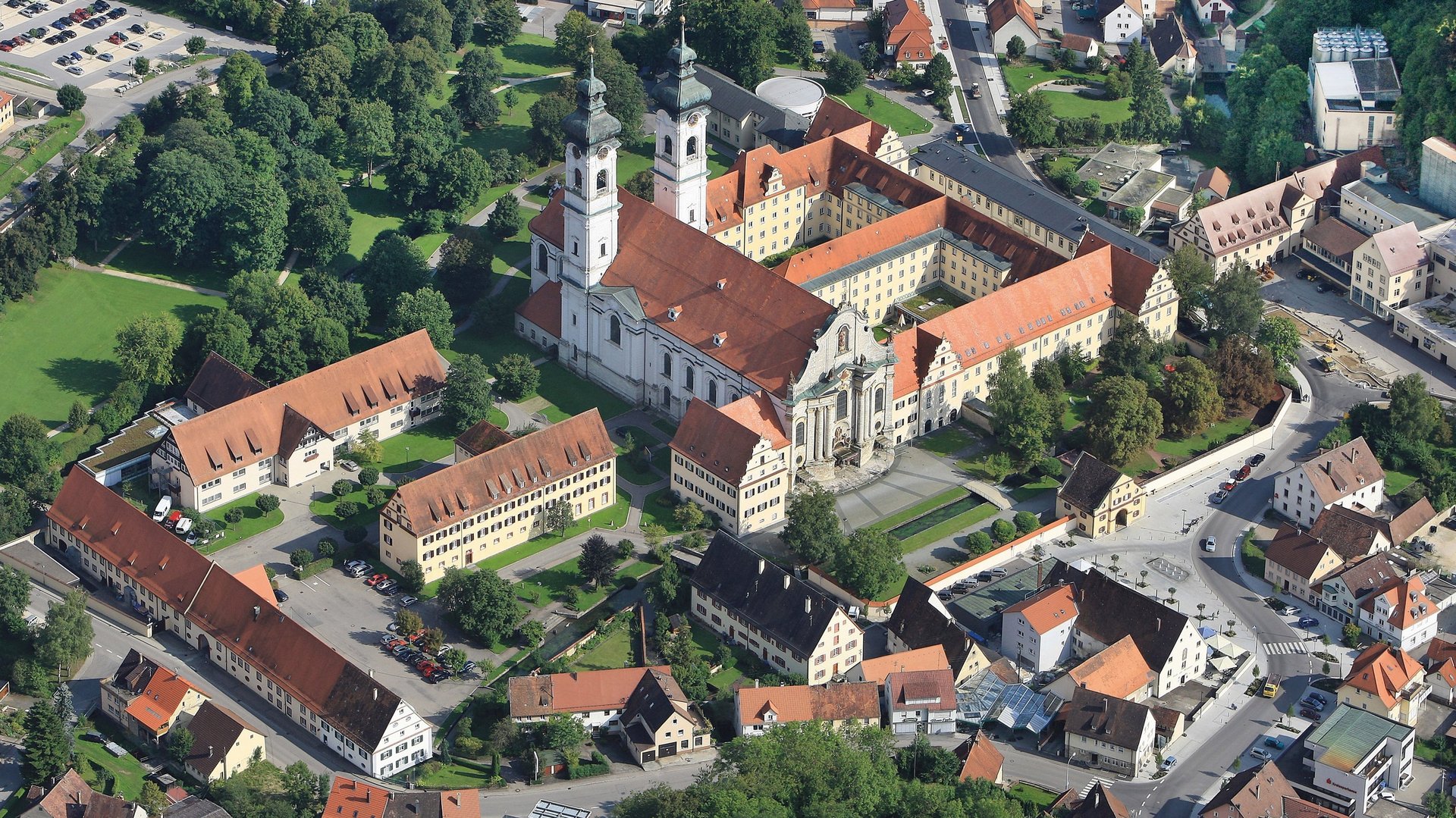 woman wearing yellow long-sleeved dress under white clouds and blue sky during daytime