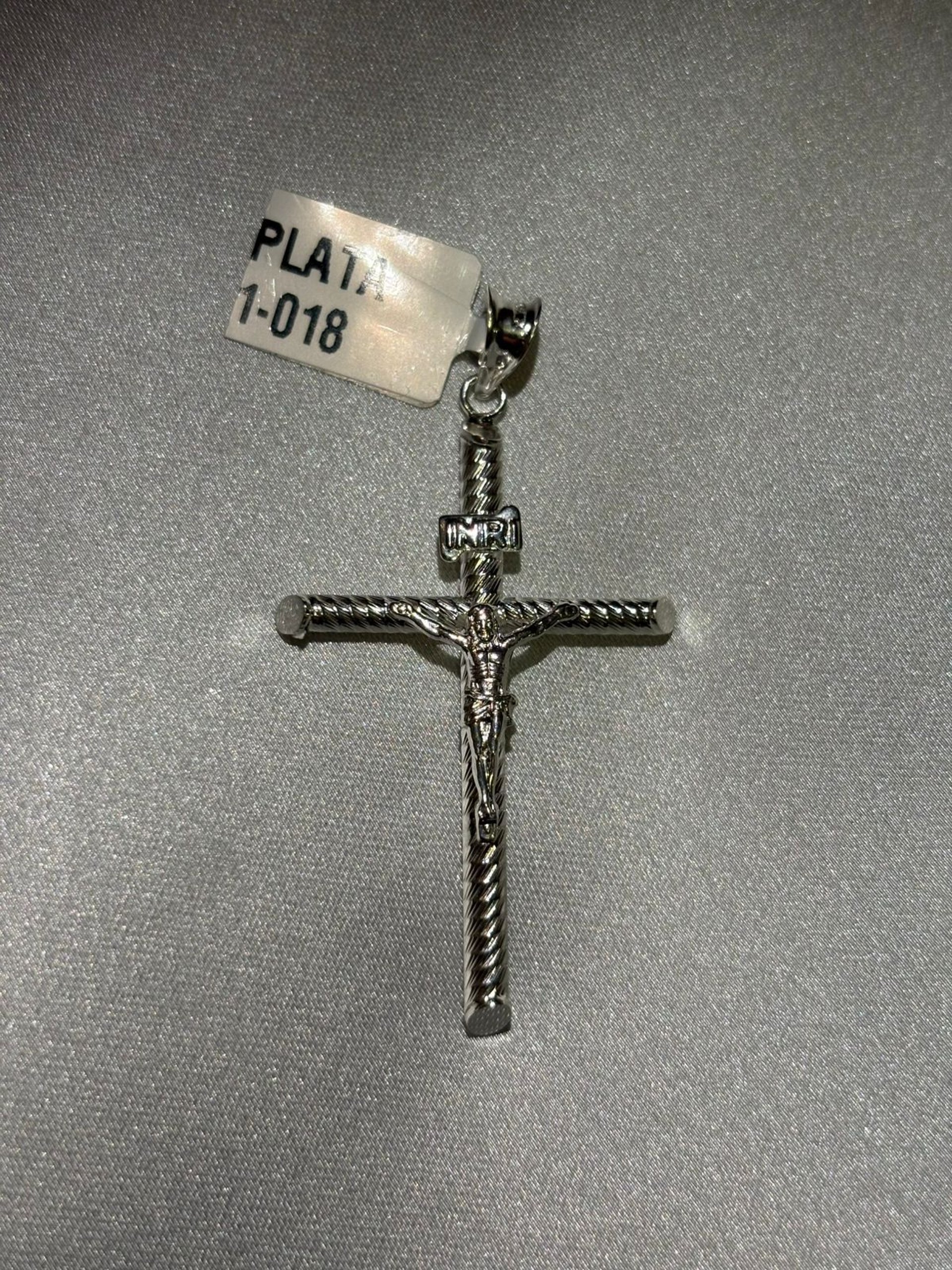 person wearing grey knit sweater