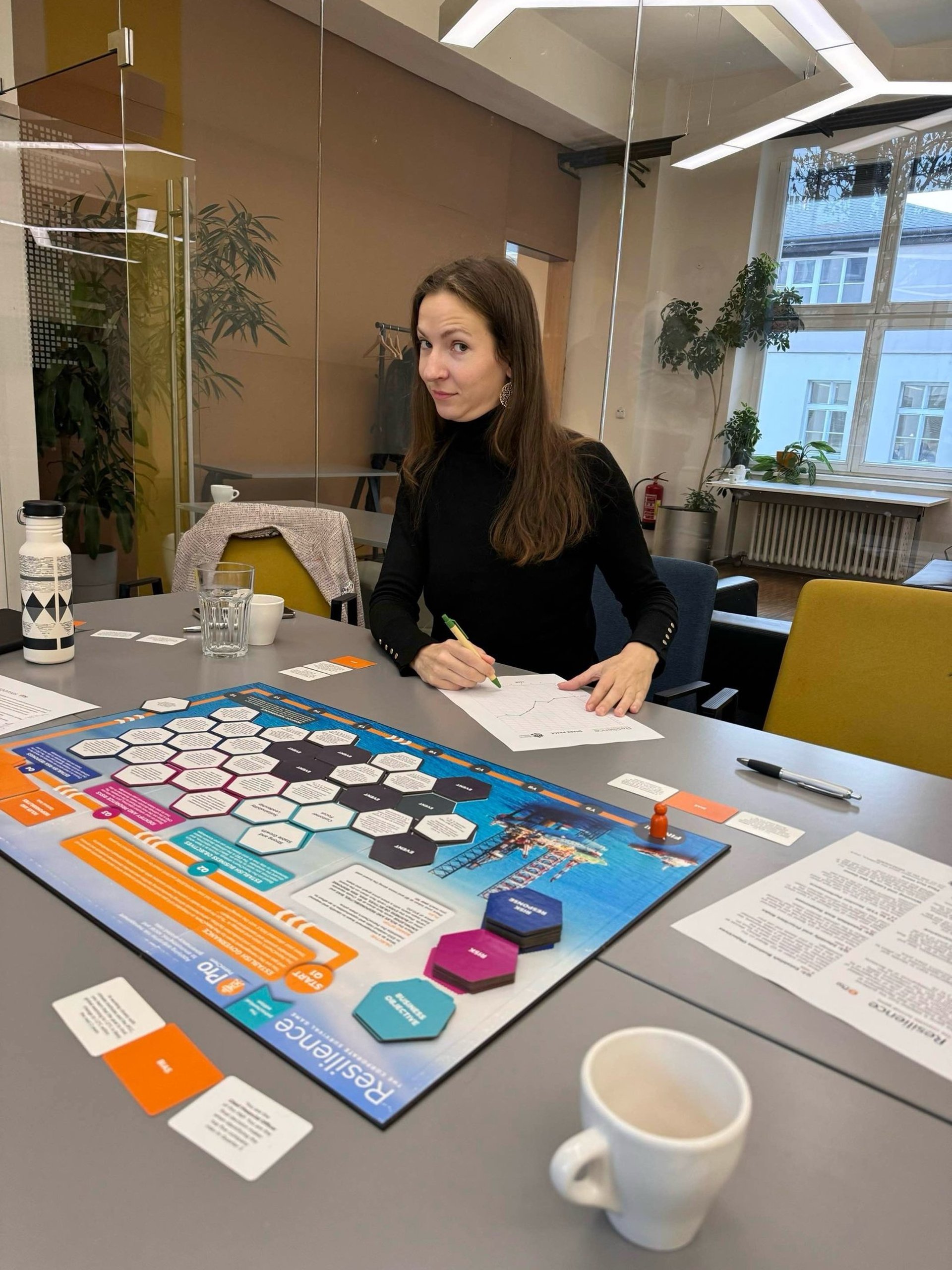 black and silver laptop computer on brown wooden table