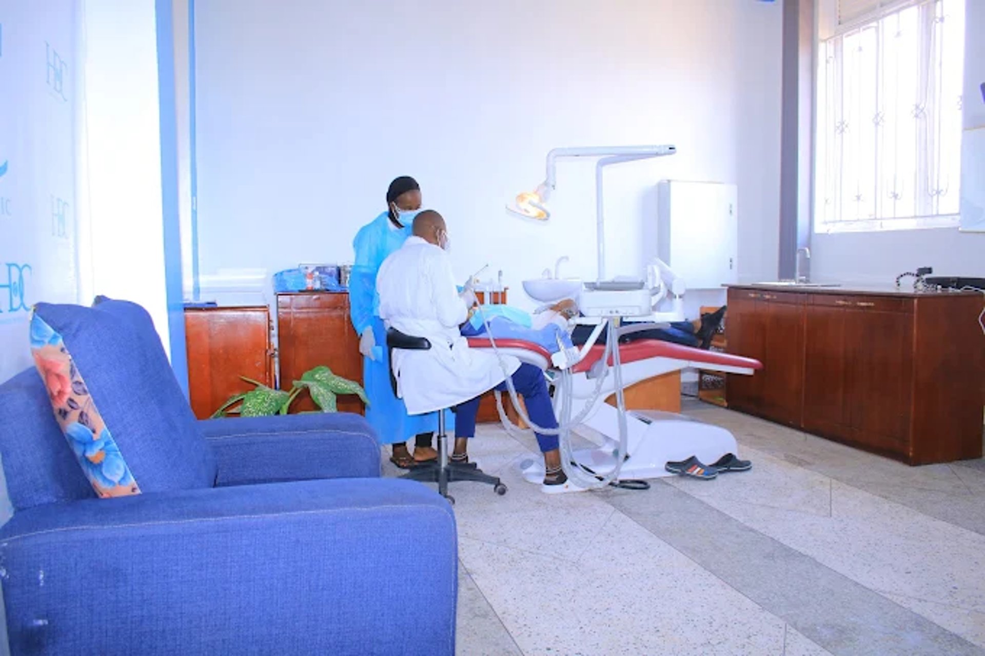 a room filled with furniture and a large window