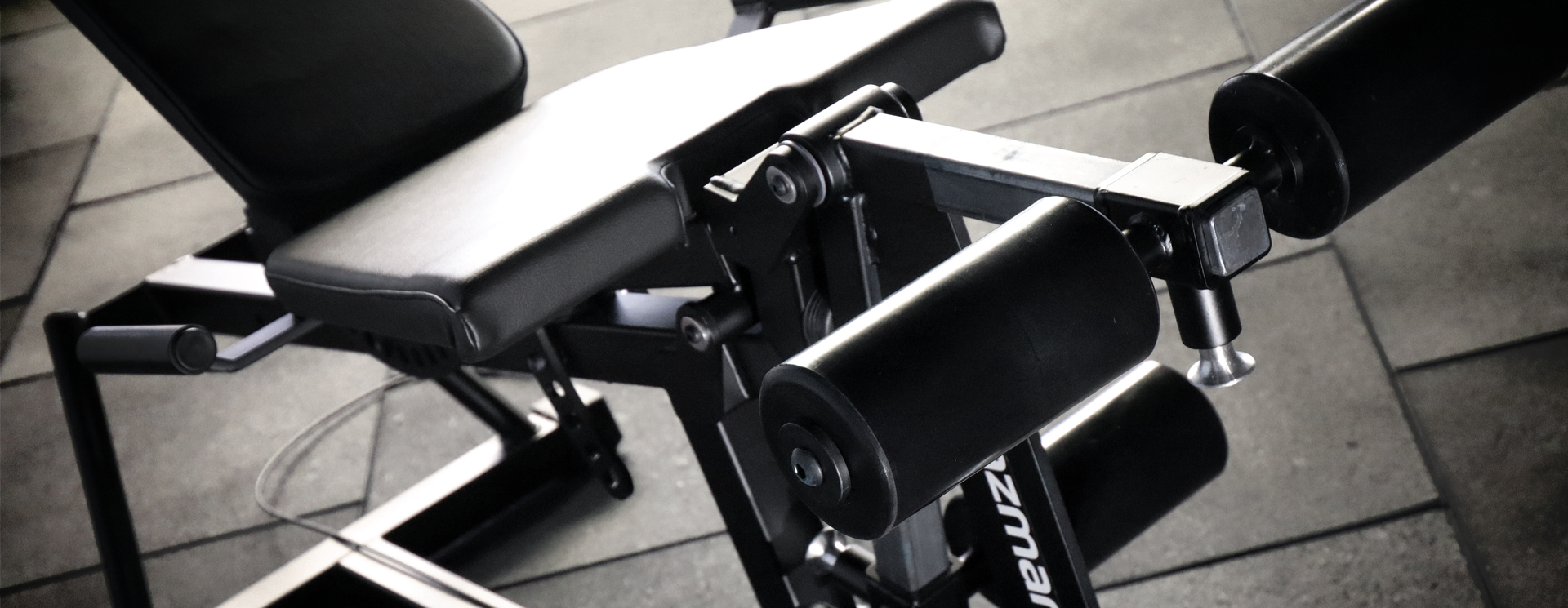 grayscale photo of man working out