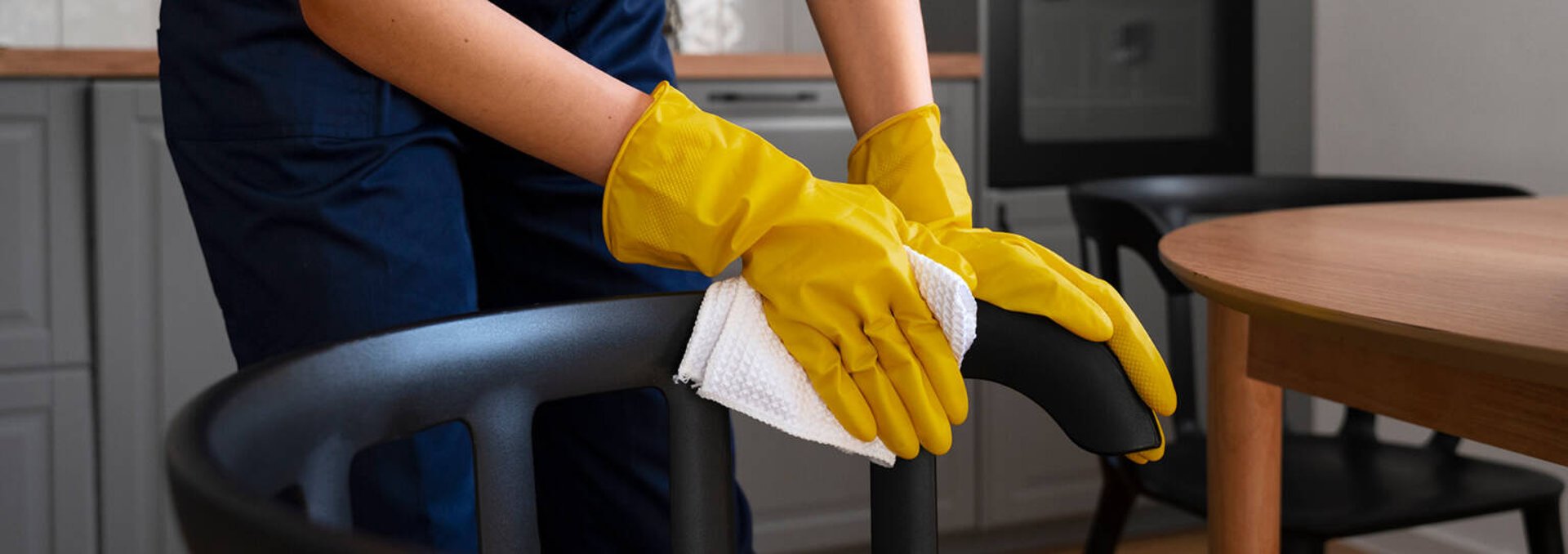 Nurse smiling with elderly patient in room