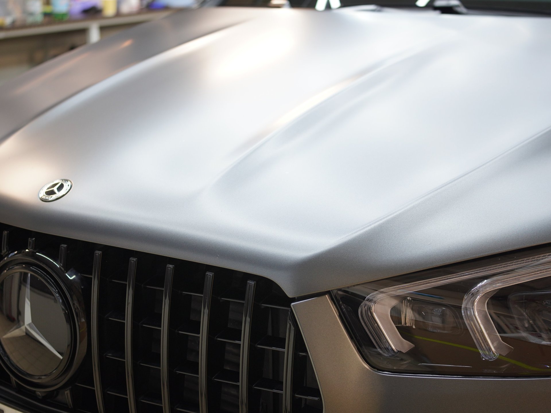 woman wearing yellow long-sleeved dress under white clouds and blue sky during daytime