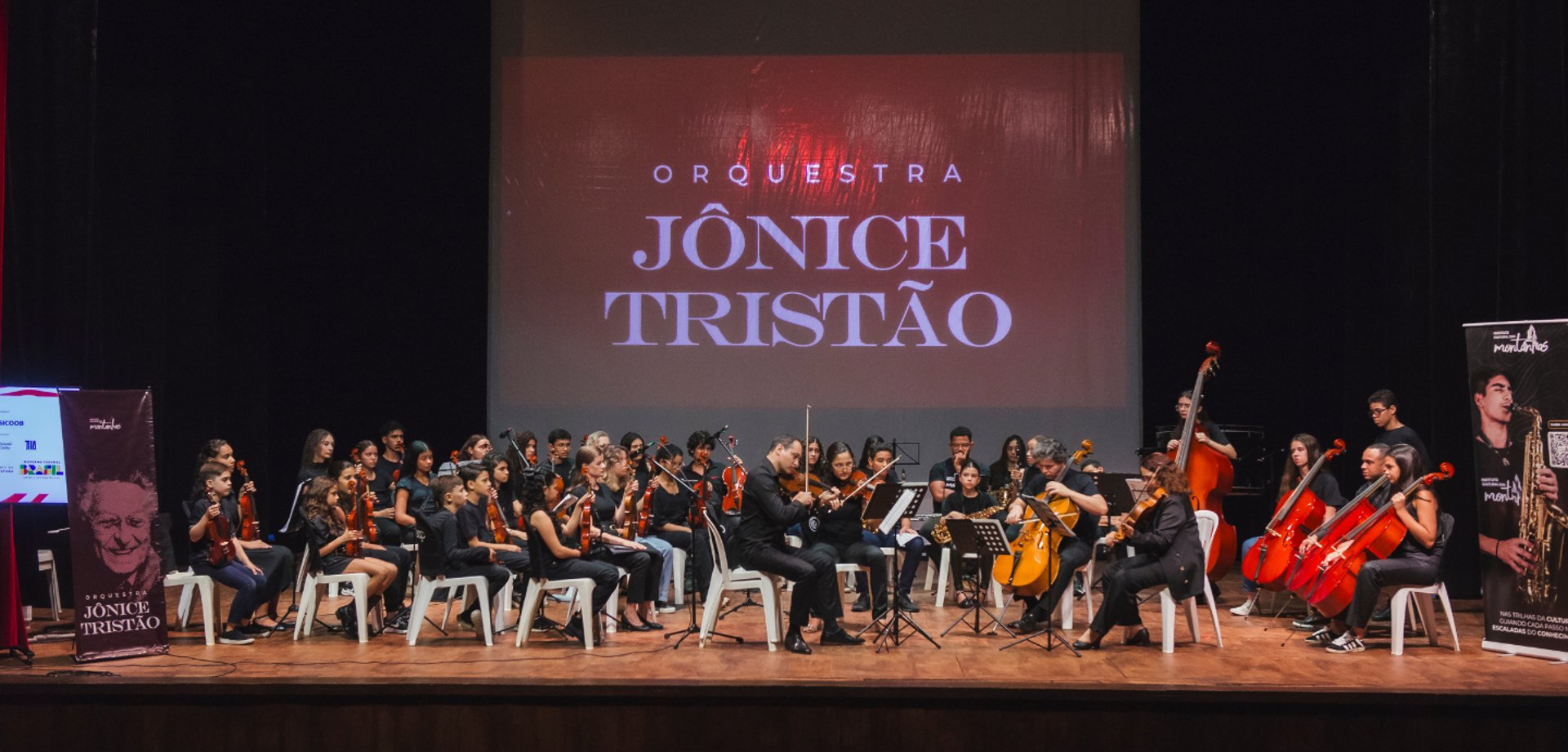 an abstract photo of a curved building with a blue sky in the background