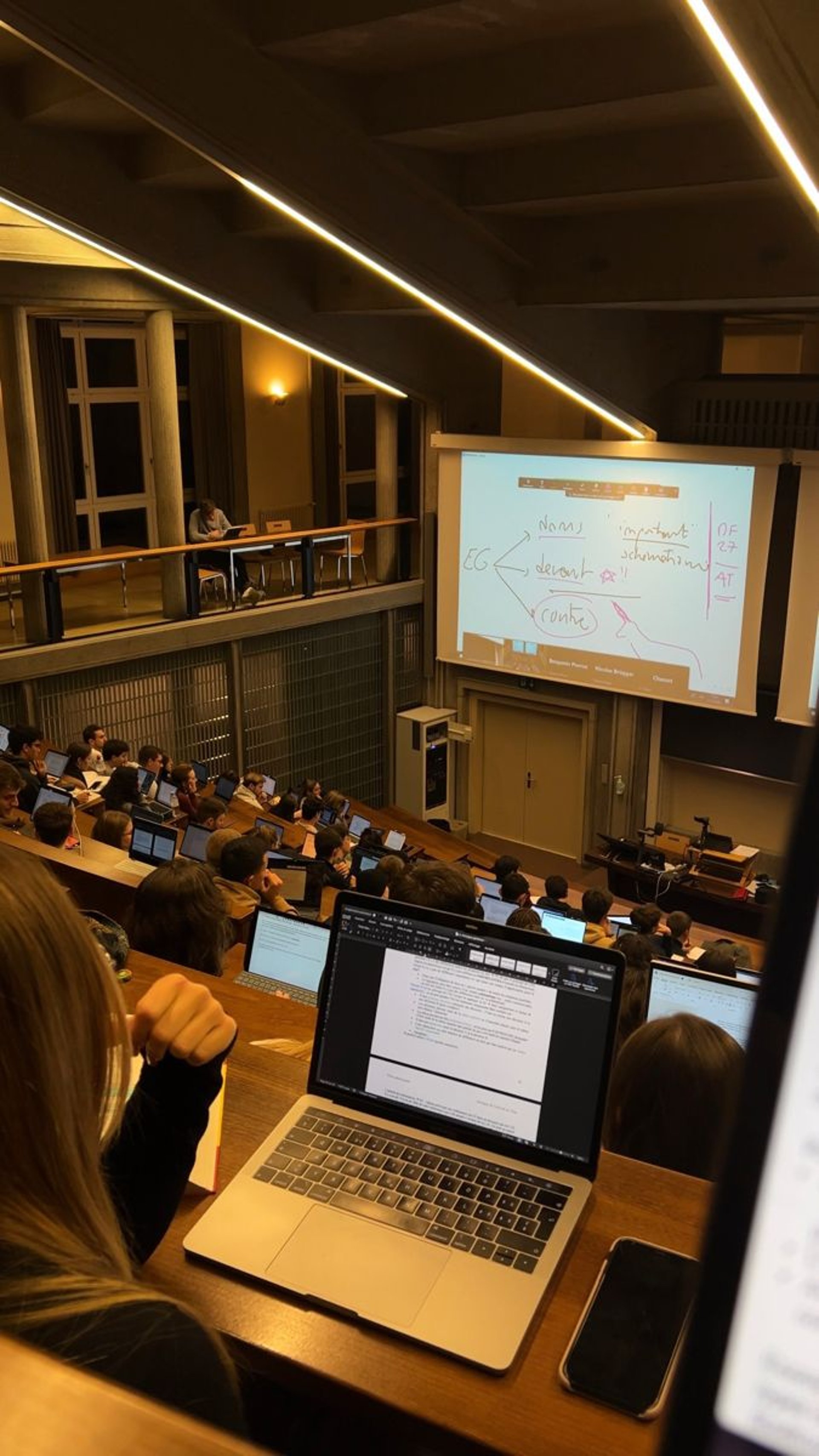 an abstract photo of a curved building with a blue sky in the background