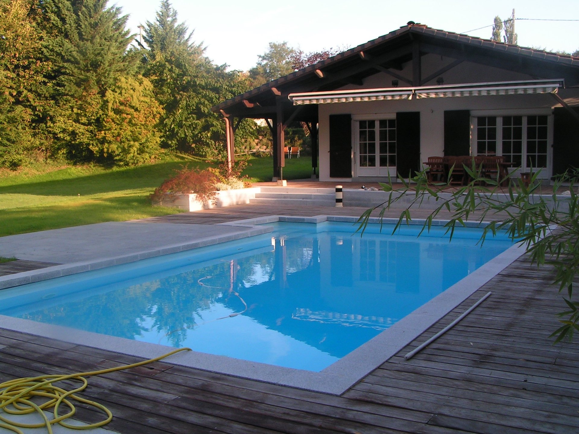 woman wearing yellow long-sleeved dress under white clouds and blue sky during daytime
