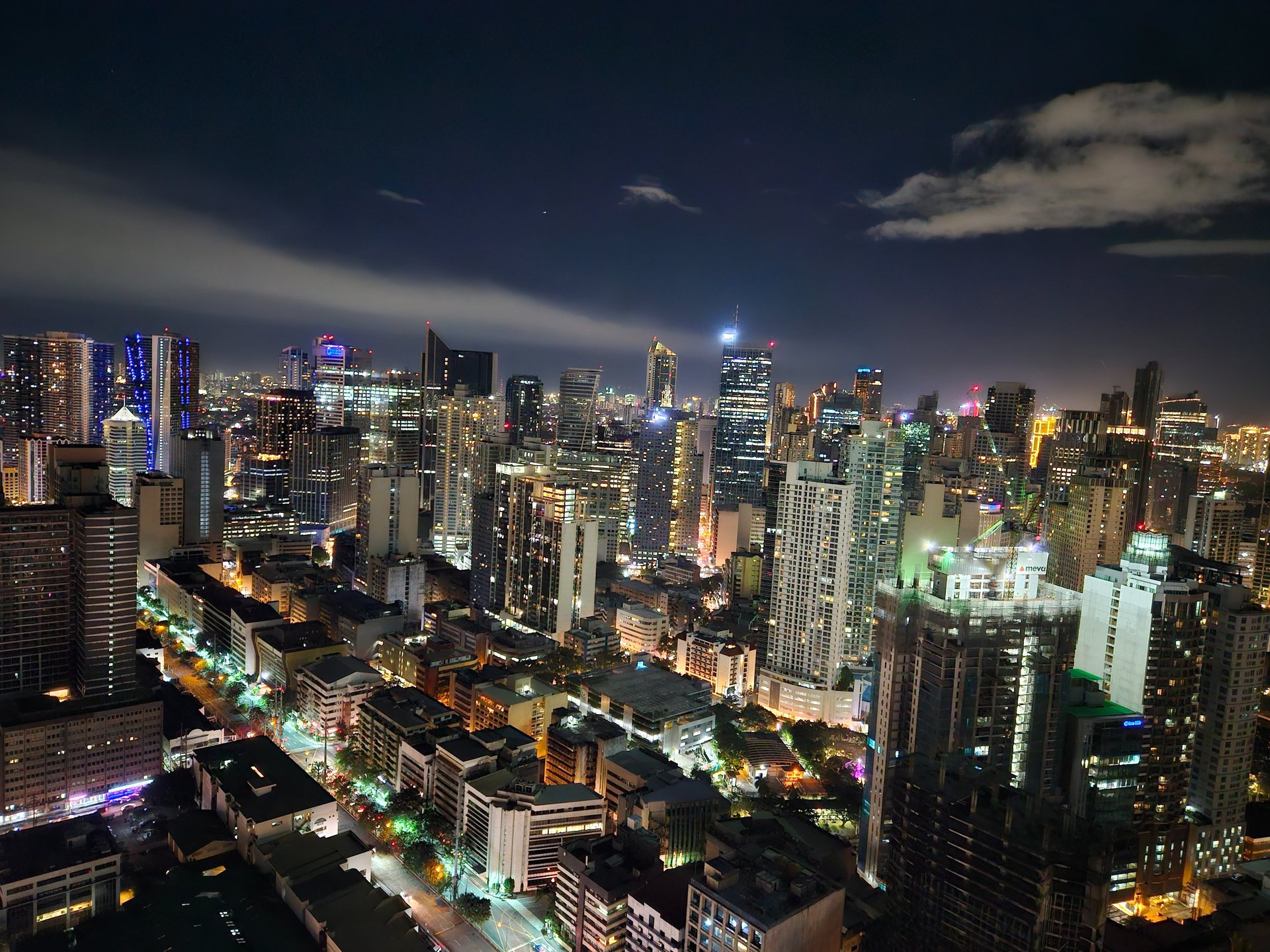 low-angle photography of black high-rise building