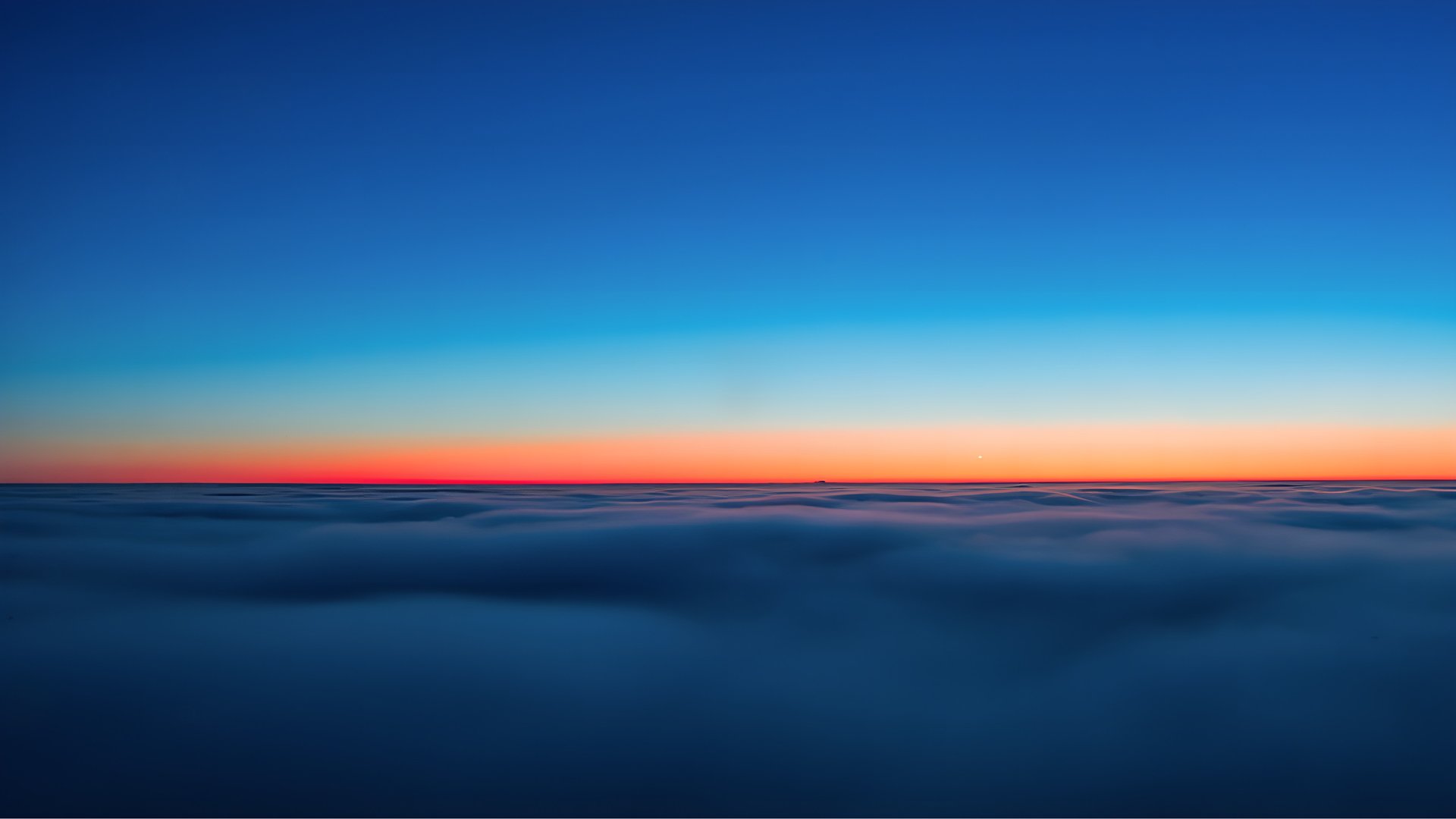snow covered mountain under blue sky during daytime