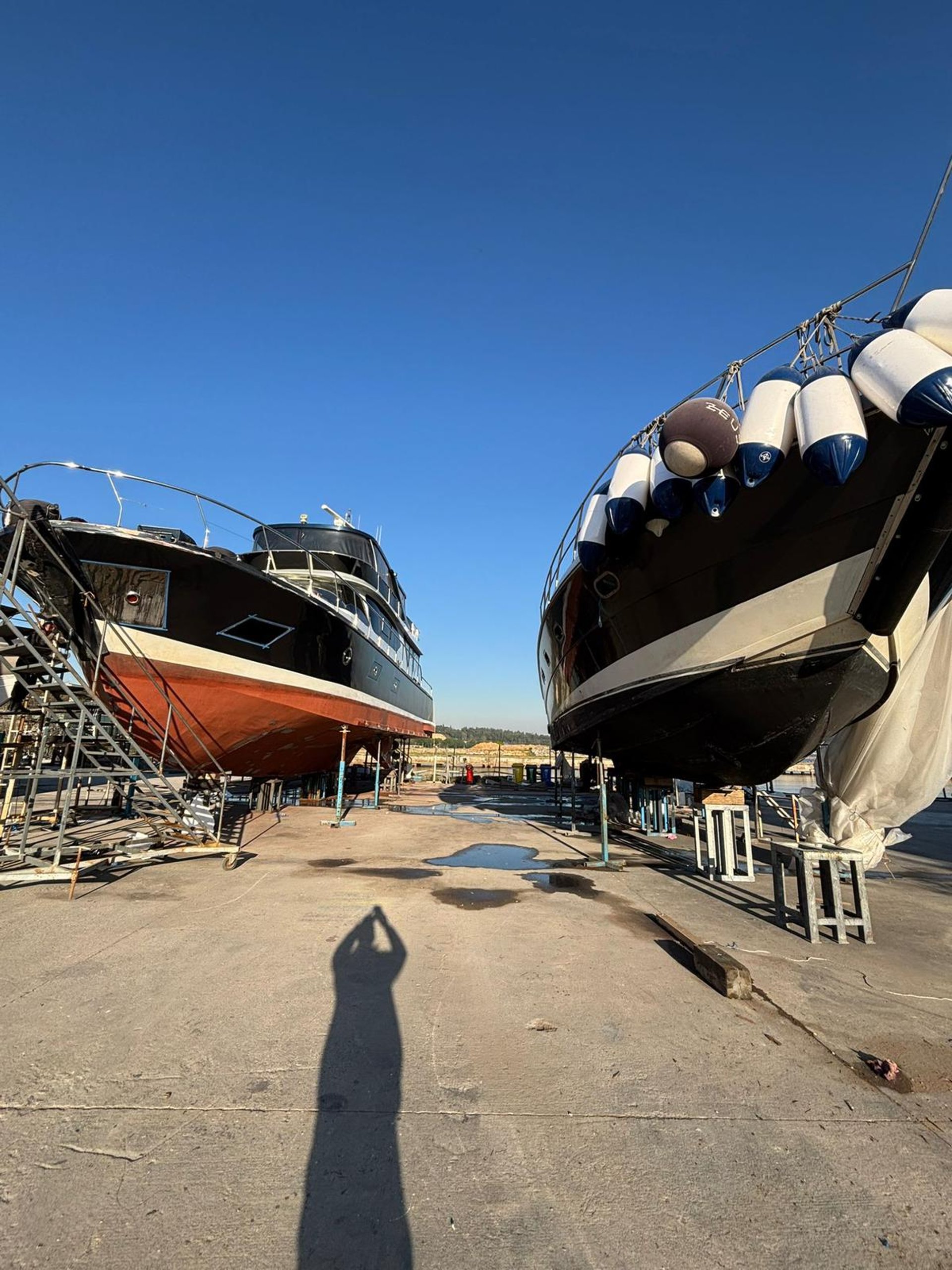 black and brown leather padded tub sofa