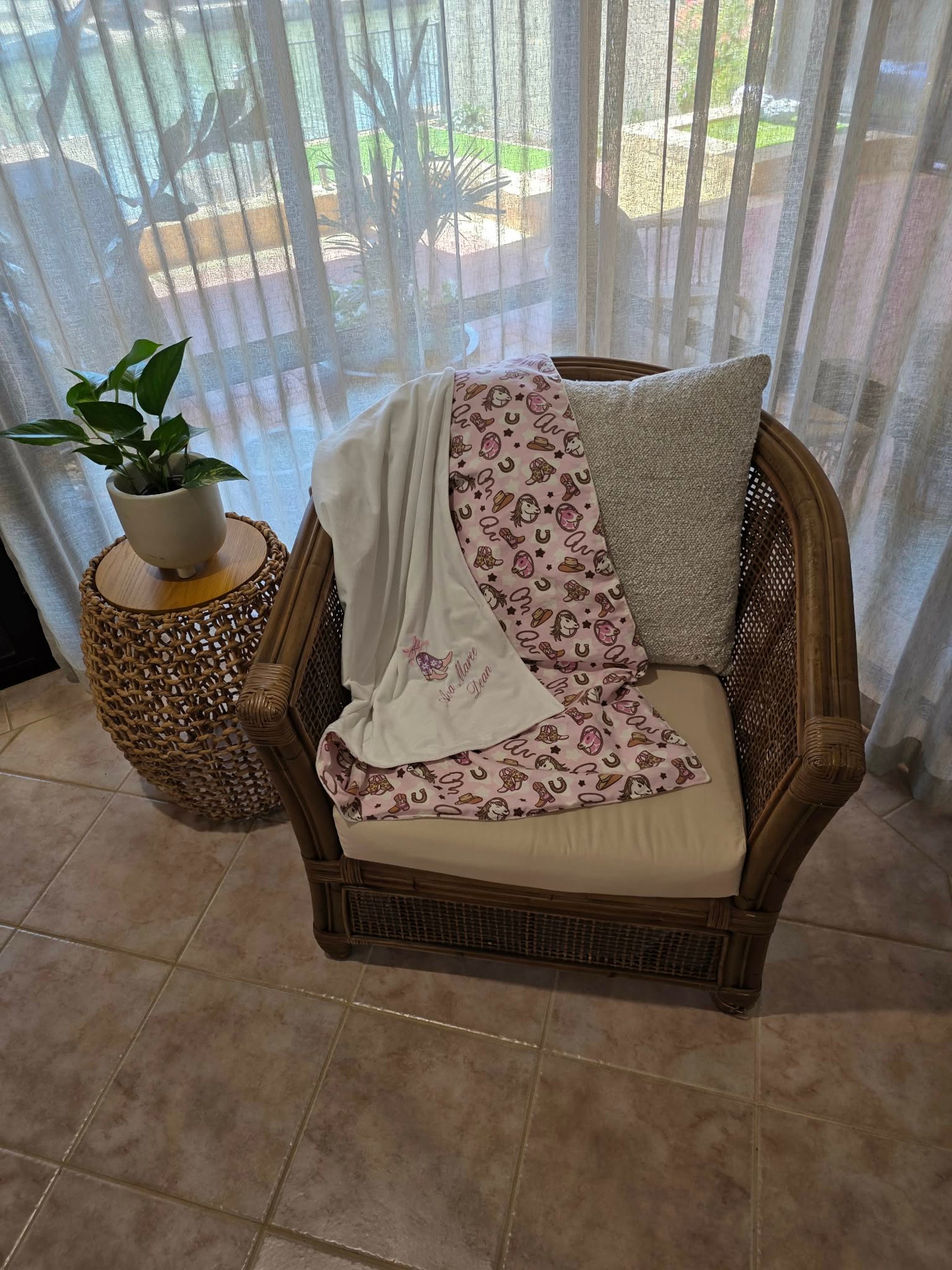 person wearing grey knit sweater