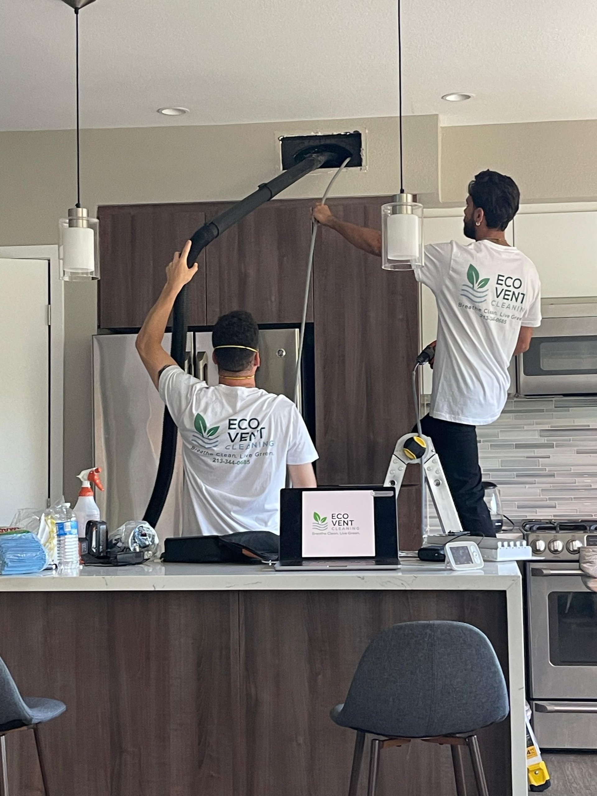 black and brown leather padded tub sofa