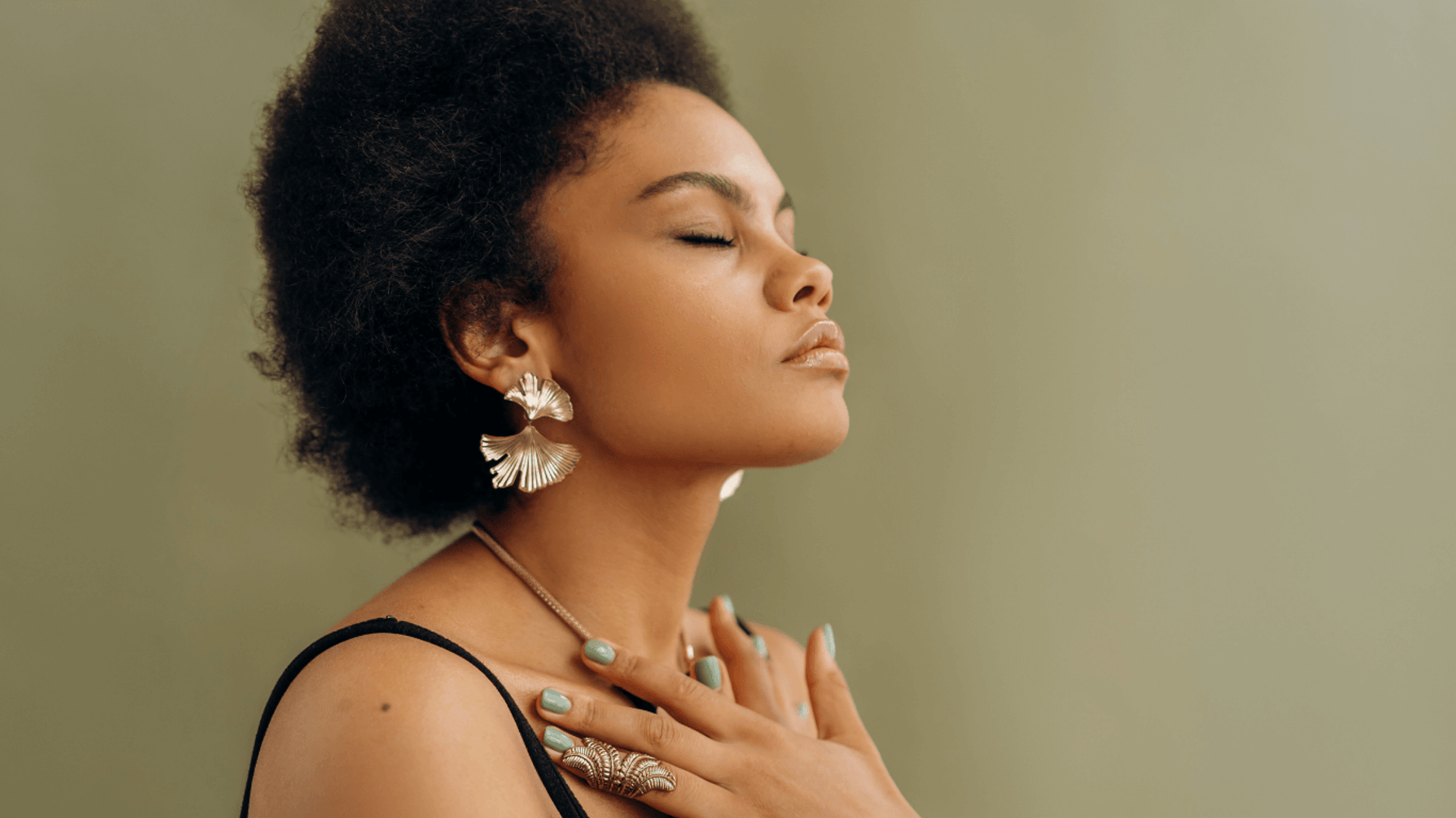 Double exposure of person and forest landscape.