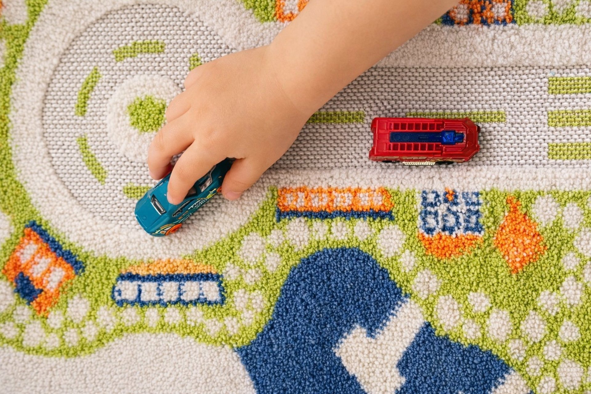 woman in black jacket using macbook air