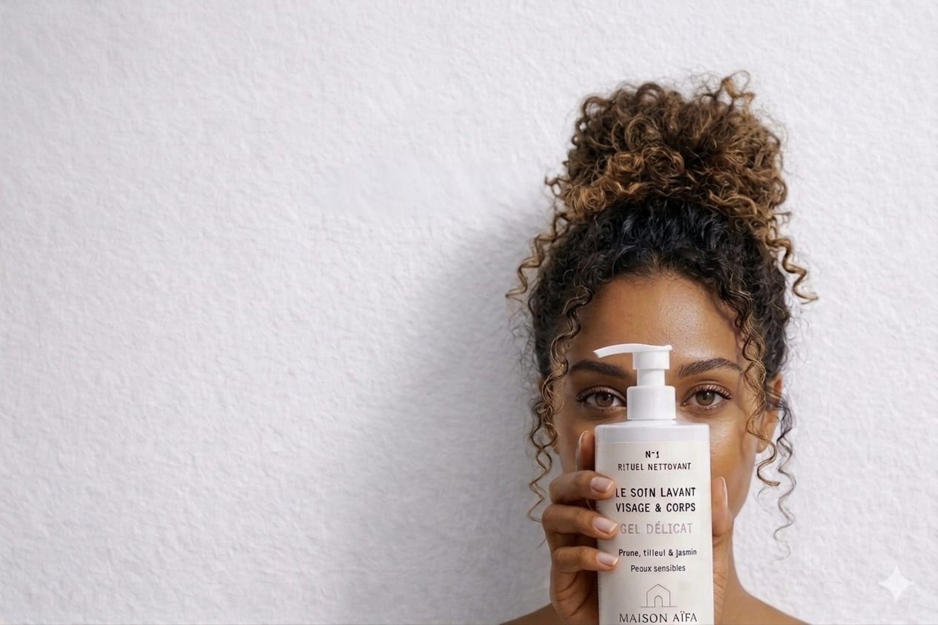 person wearing grey knit sweater