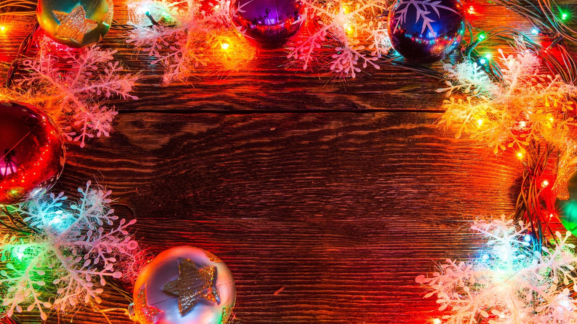 a white table topped with christmas decorations and lights