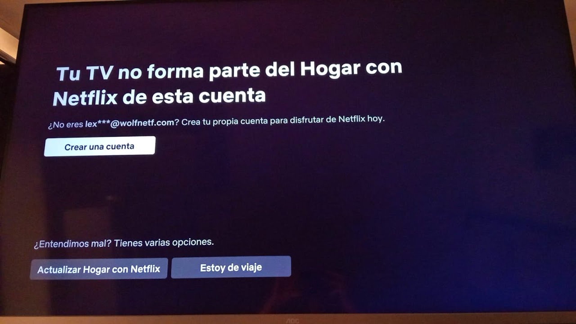 person holding brown leather bifold wallet