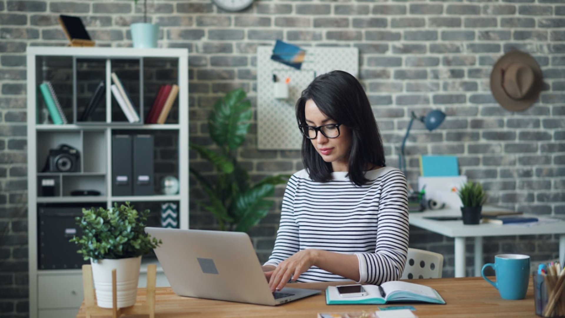 an abstract photo of a curved building with a blue sky in the background