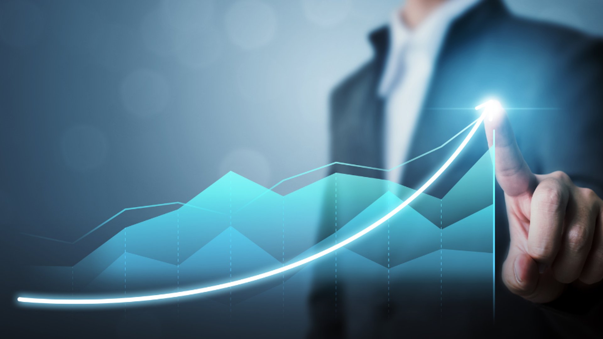 an abstract photo of a curved building with a blue sky in the background