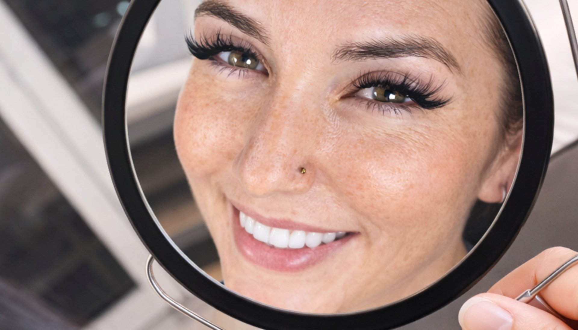 an abstract photo of a curved building with a blue sky in the background