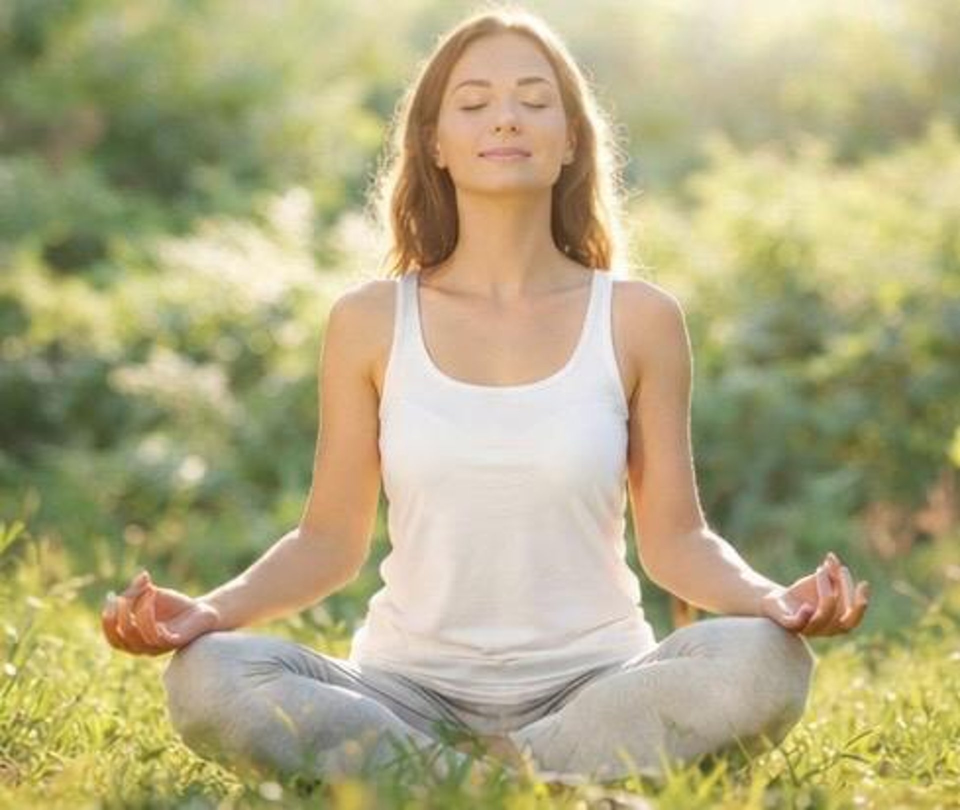 woman looking left side while holding plastic tumbler