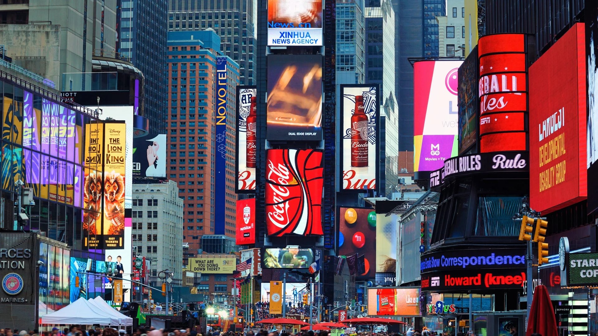 an abstract photo of a curved building with a blue sky in the background