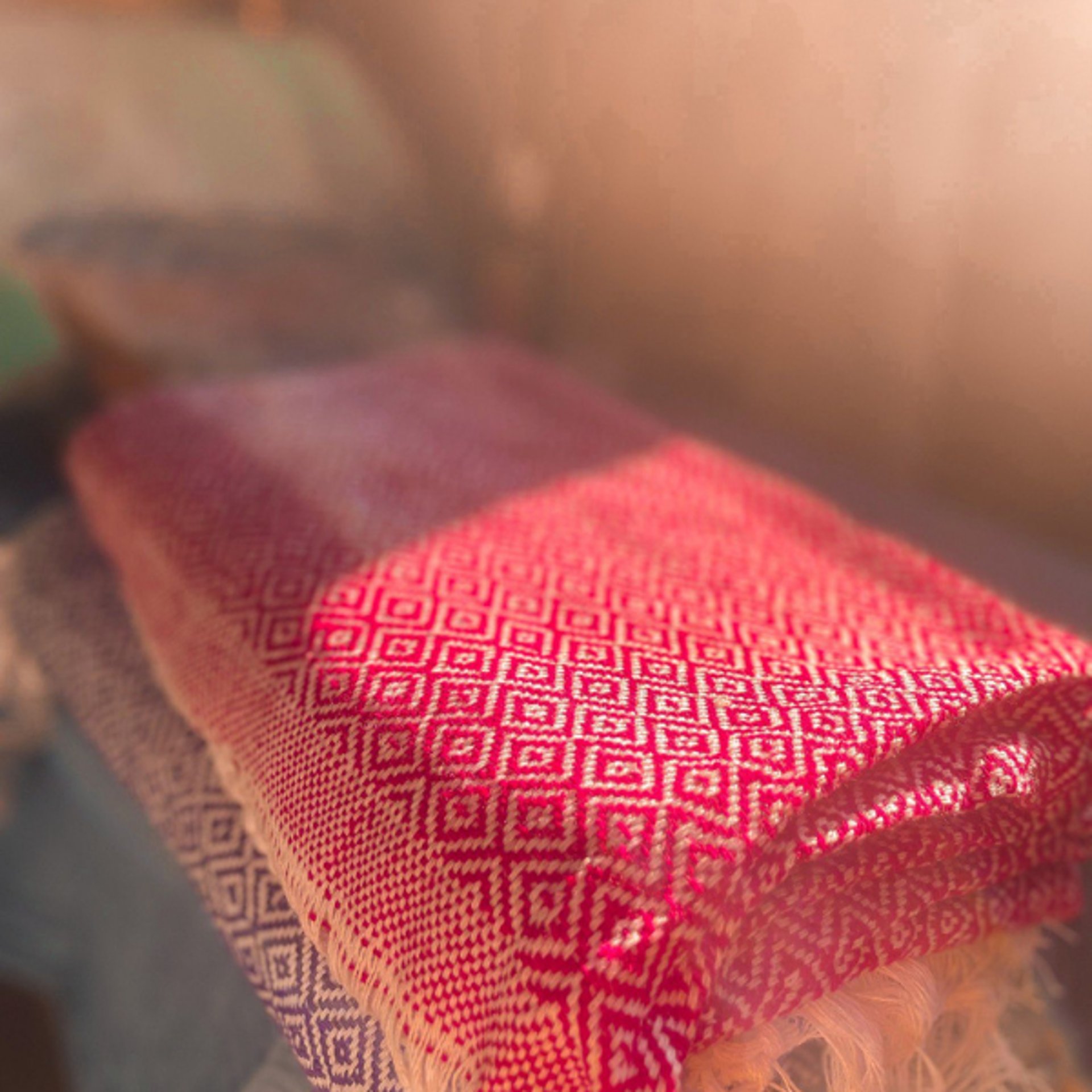 an abstract photo of a curved building with a blue sky in the background
