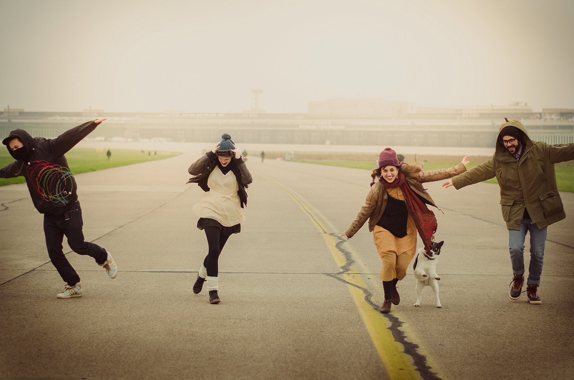 an abstract photo of a curved building with a blue sky in the background