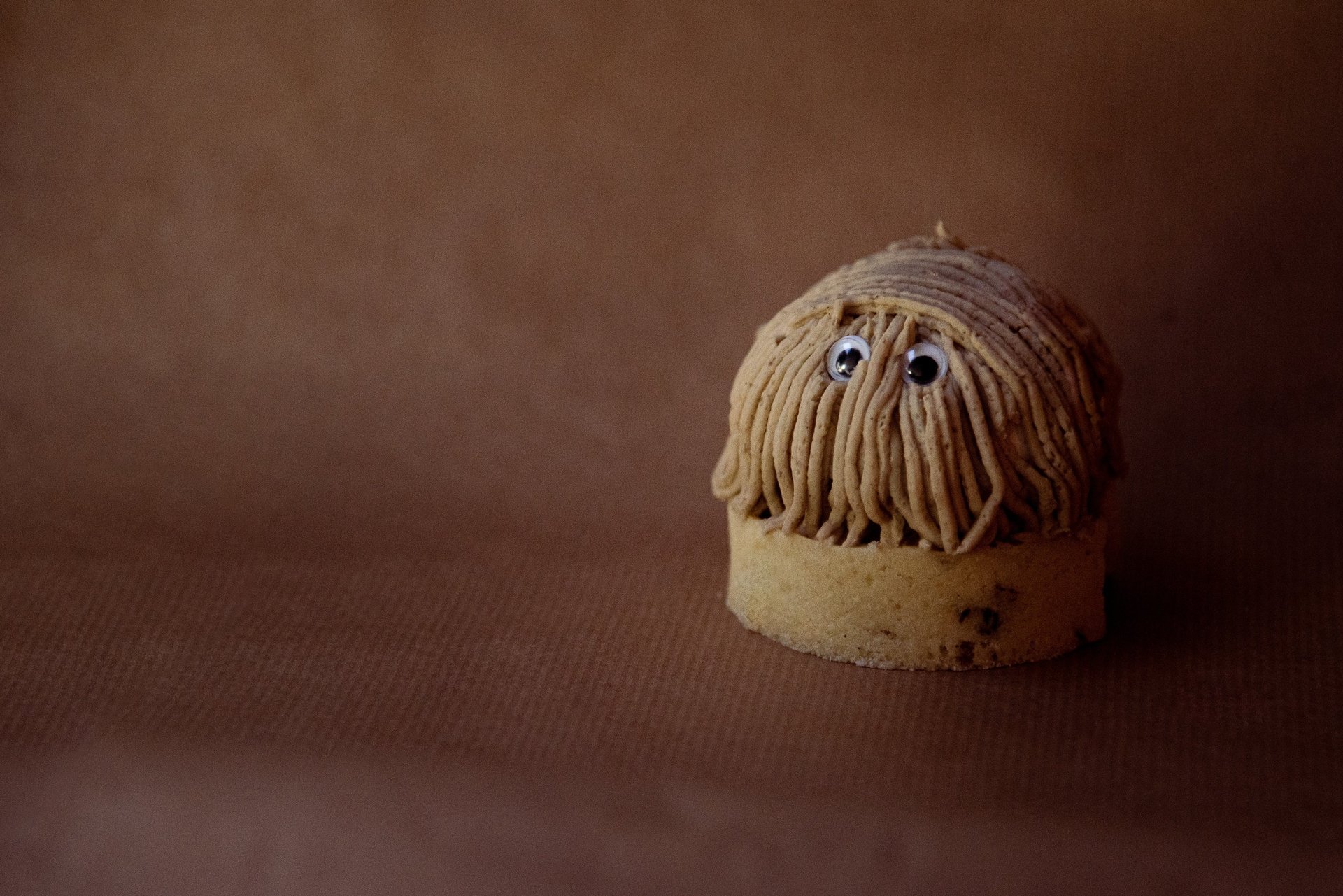 an abstract photo of a curved building with a blue sky in the background