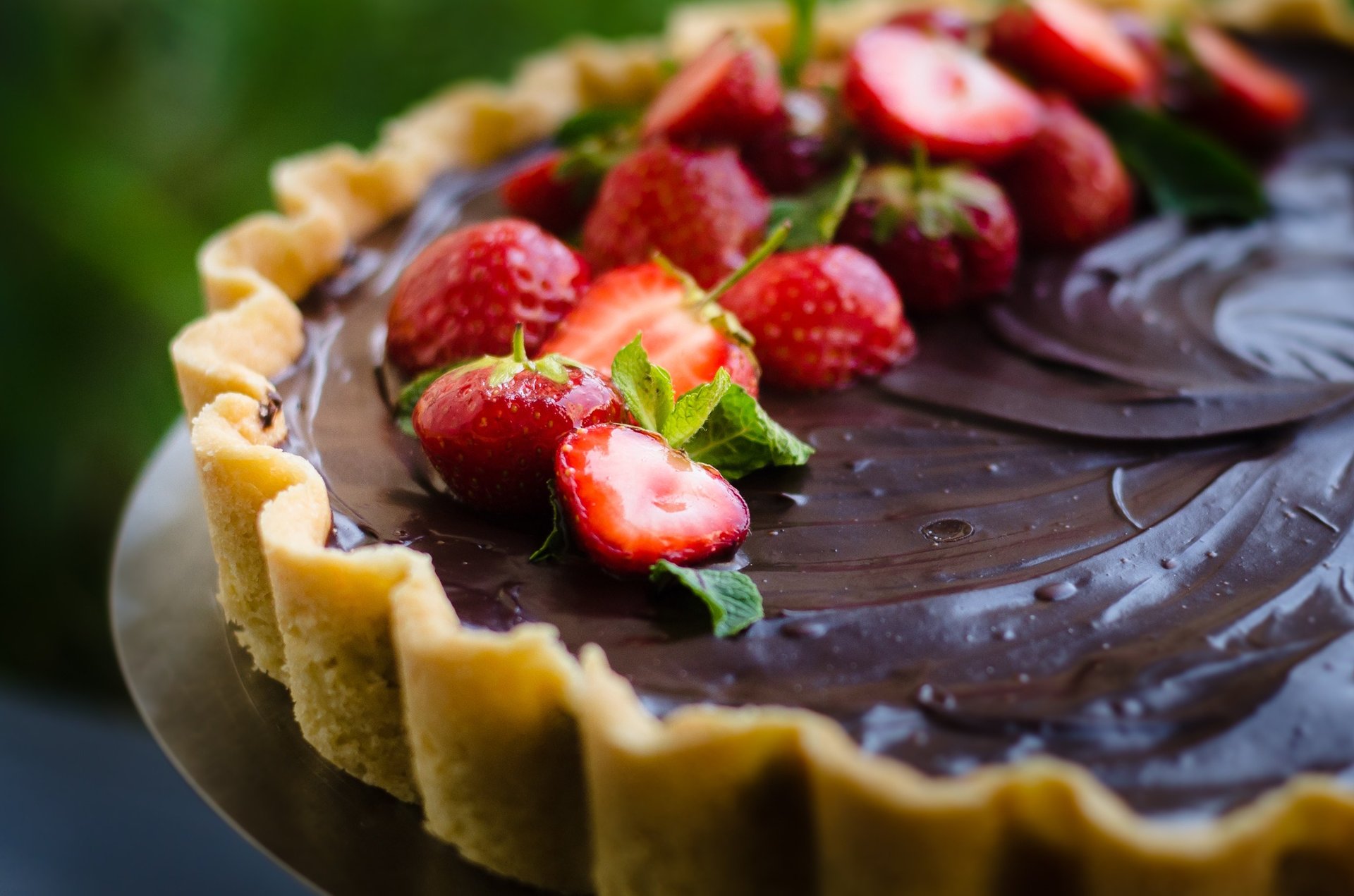 an abstract photo of a curved building with a blue sky in the background