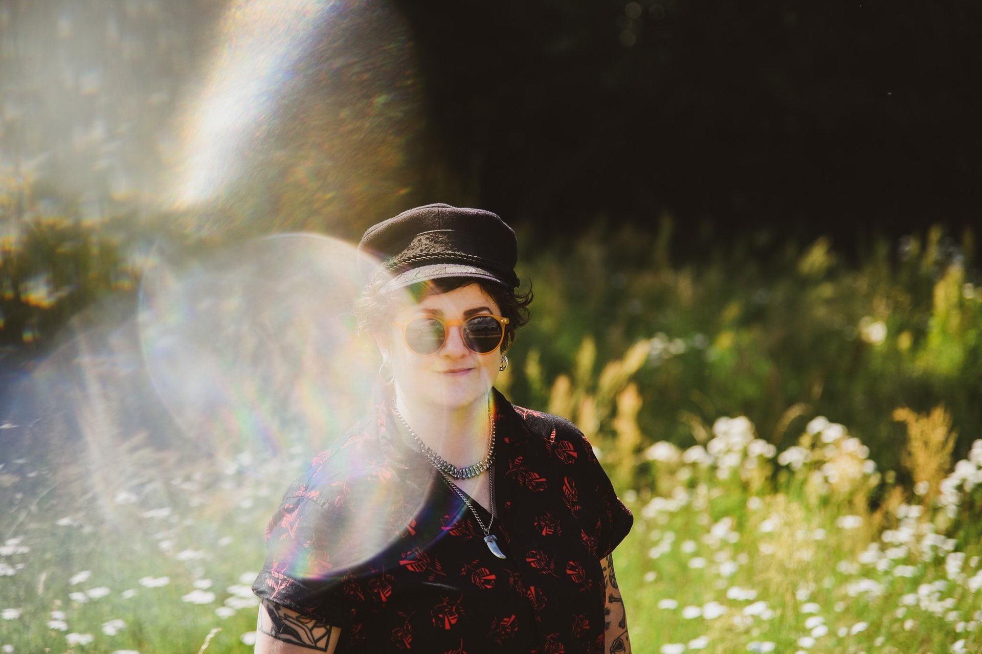 an abstract photo of a curved building with a blue sky in the background