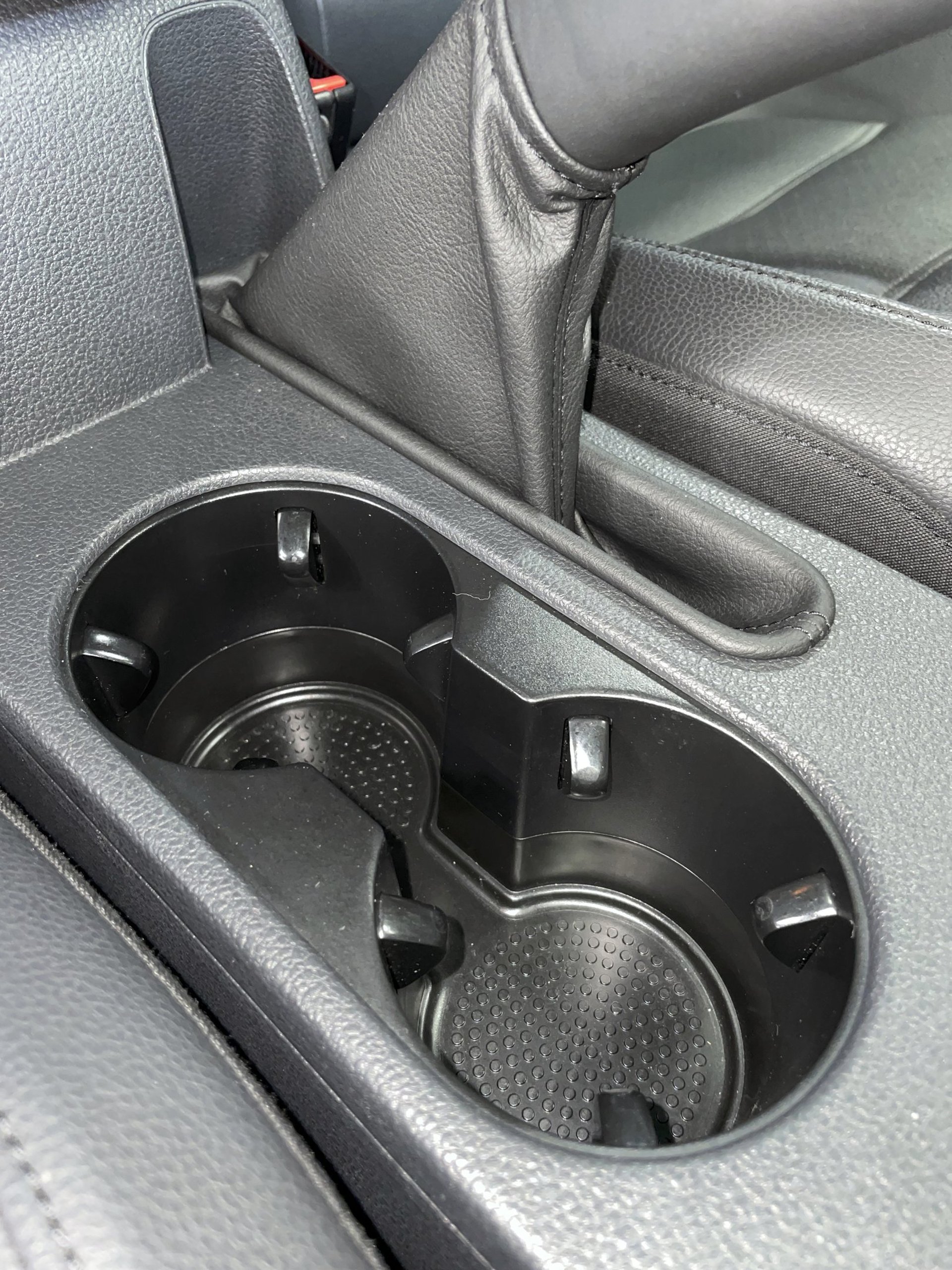 an abstract photo of a curved building with a blue sky in the background