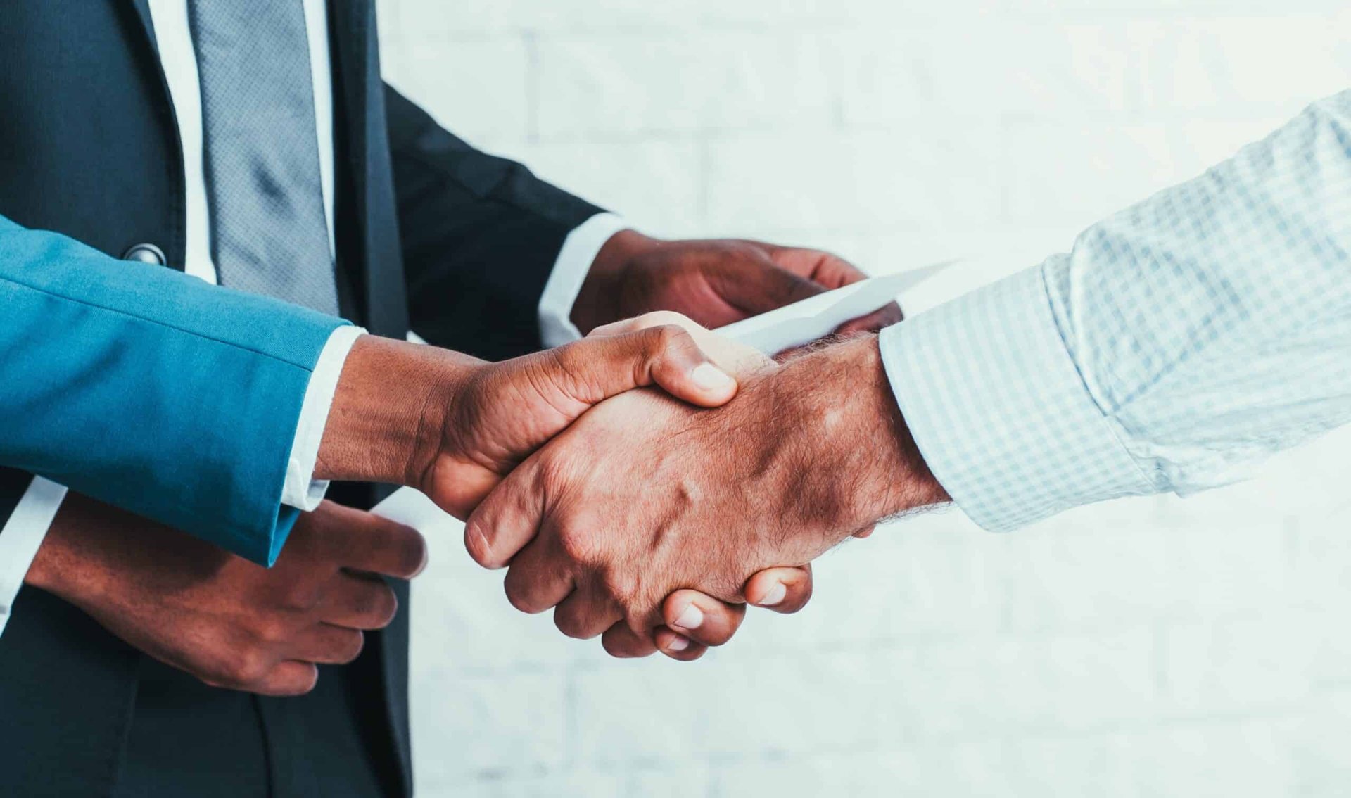 black and brown leather padded tub sofa