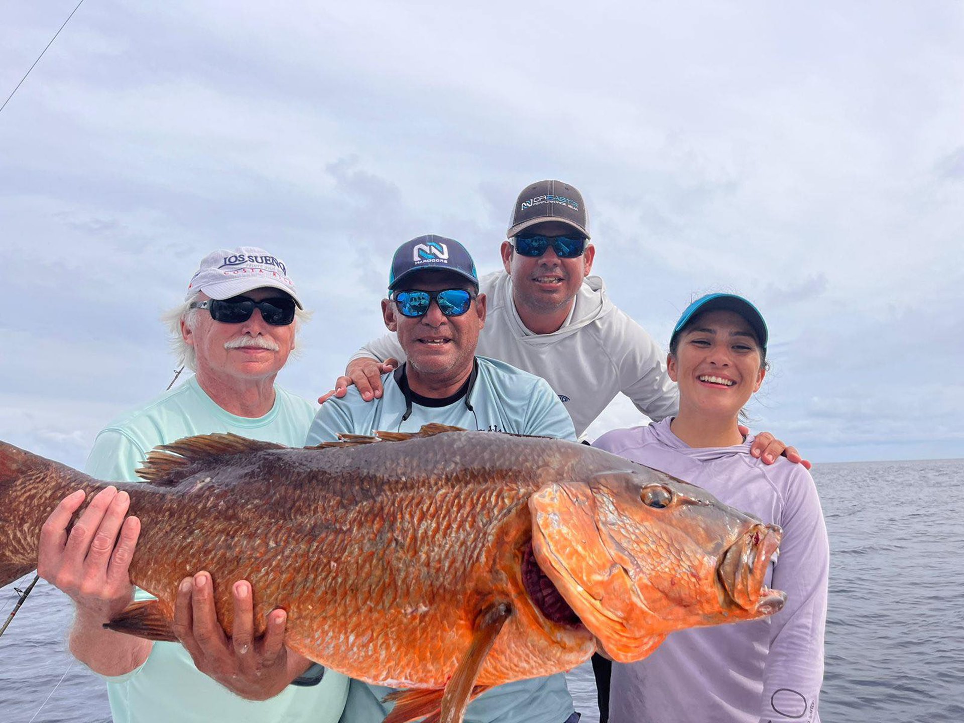 woman wearing yellow long-sleeved dress under white clouds and blue sky during daytime