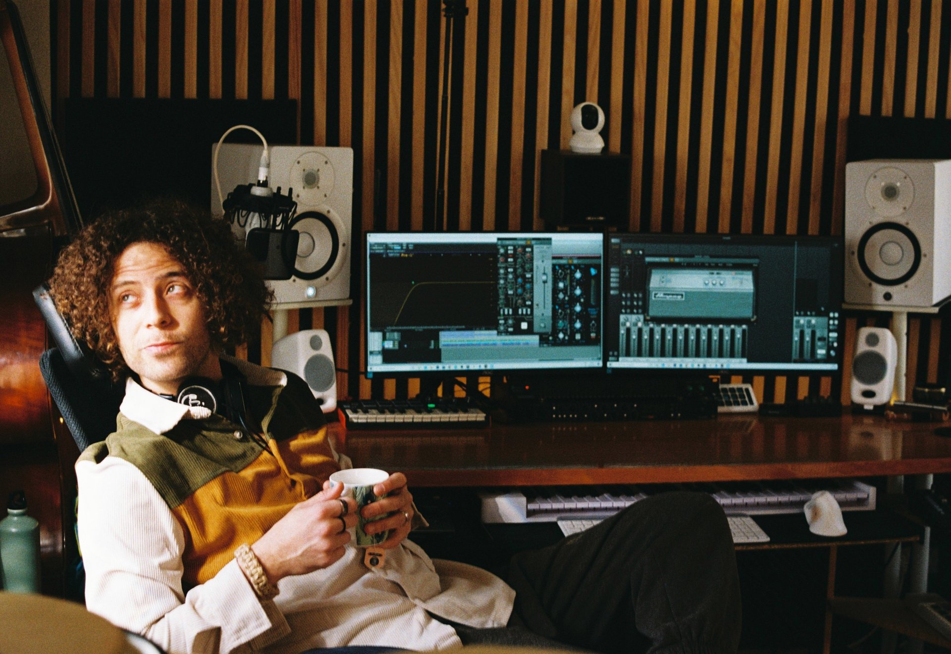 black and brown leather padded tub sofa
