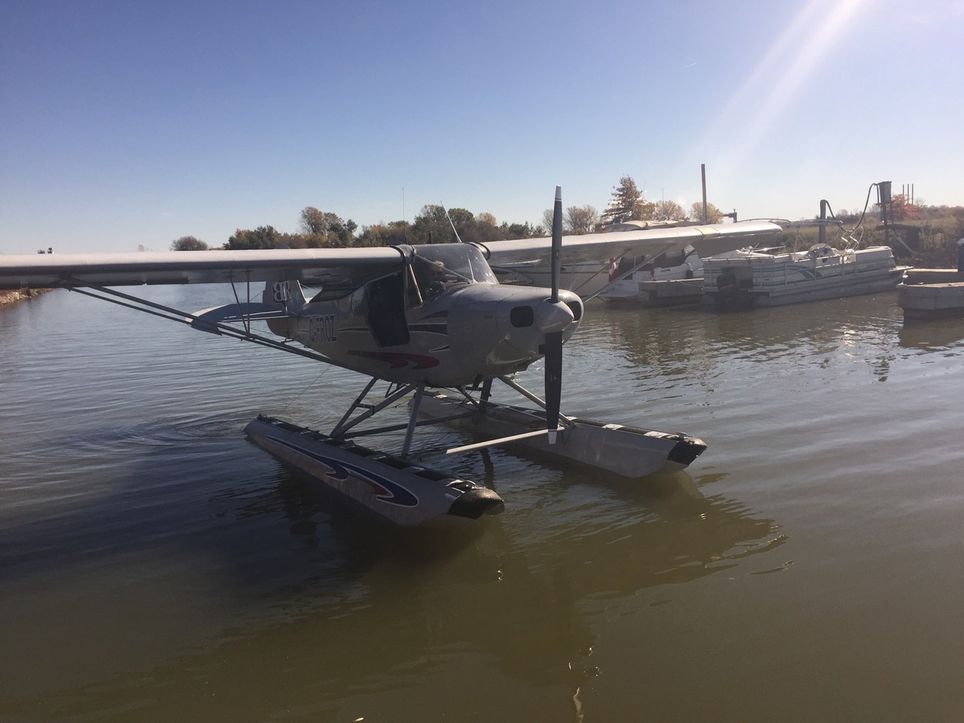 an abstract photo of a curved building with a blue sky in the background