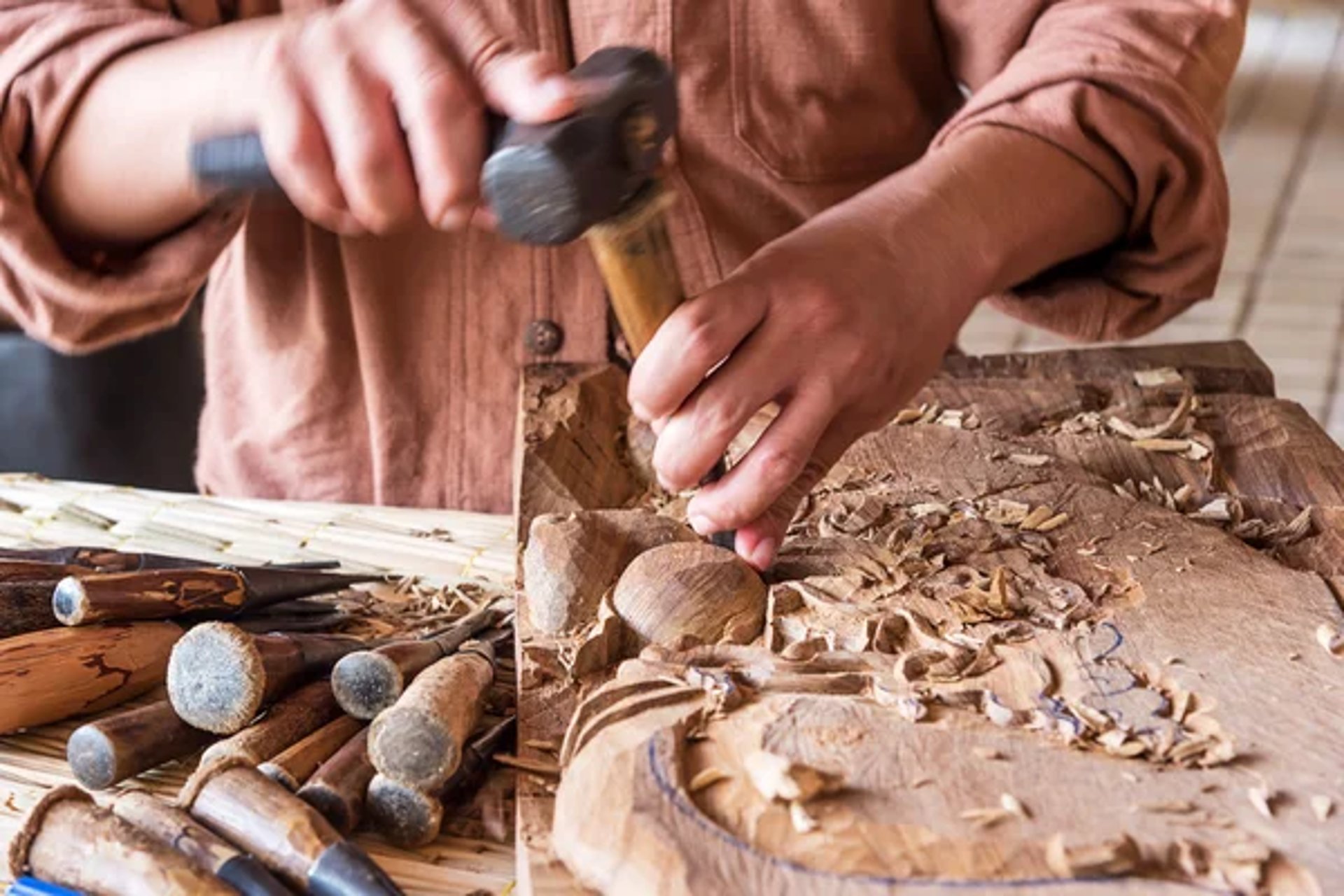 an abstract photo of a curved building with a blue sky in the background