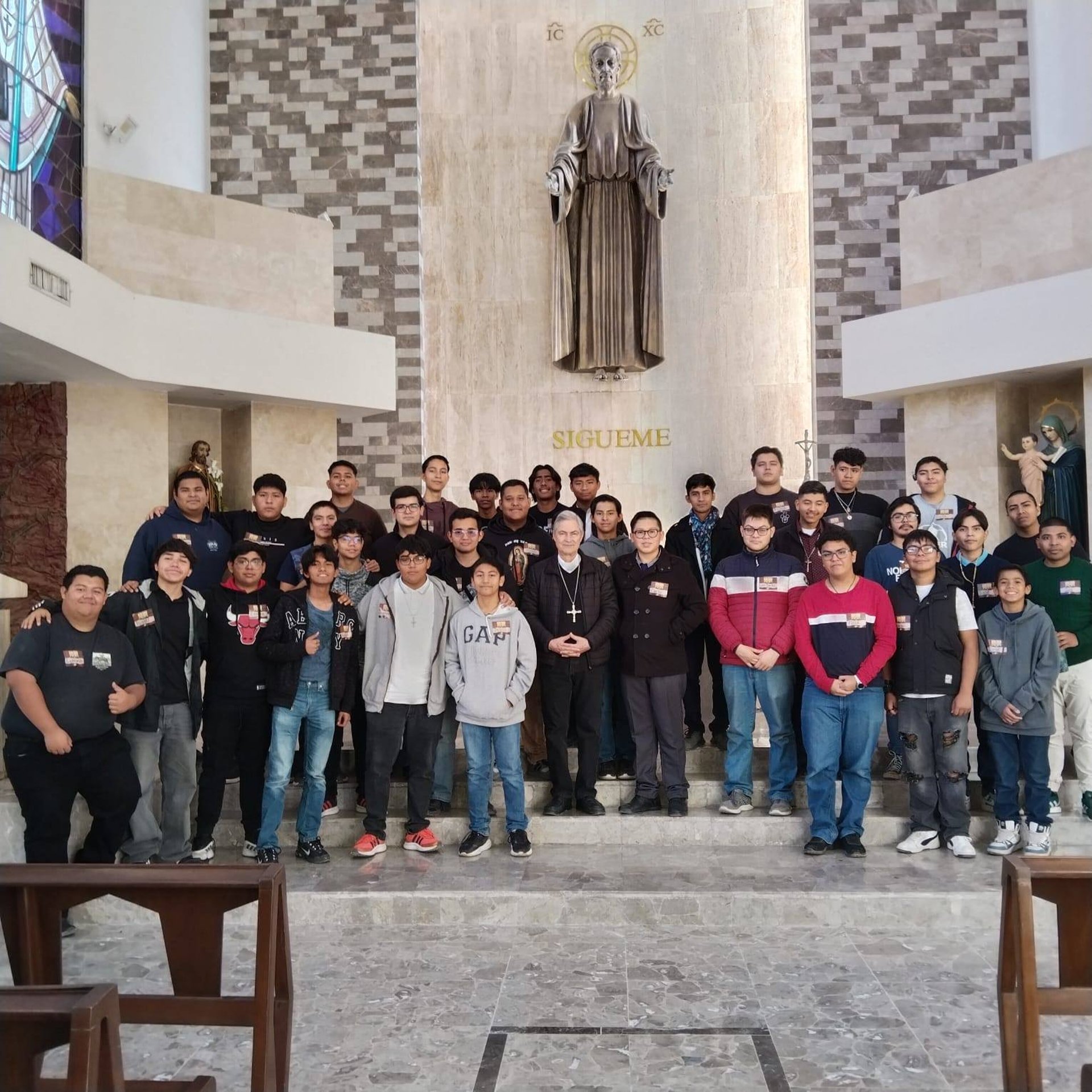 person holding white Android smartphone in white shirt