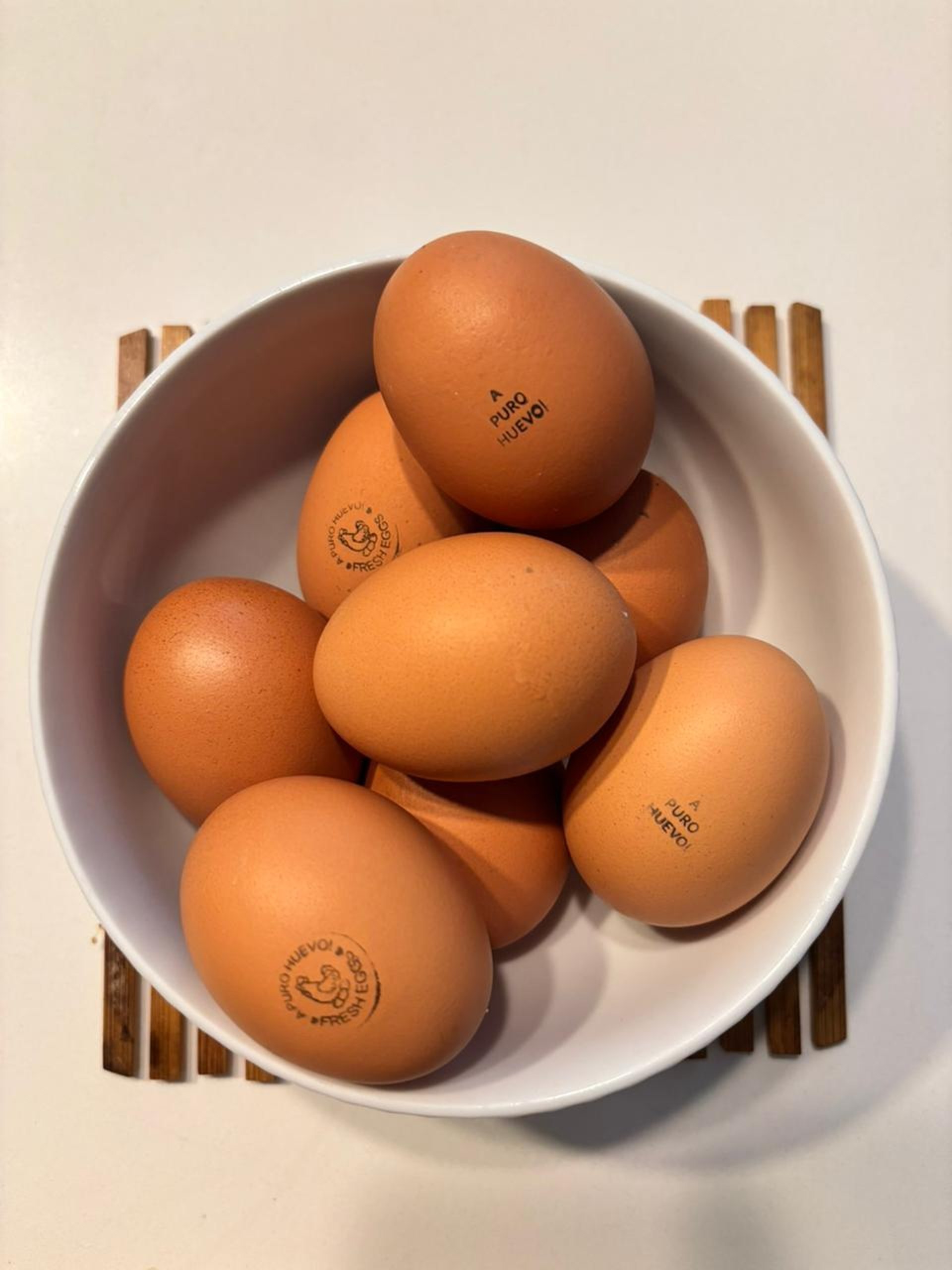 a purple carton filled with lots of eggs