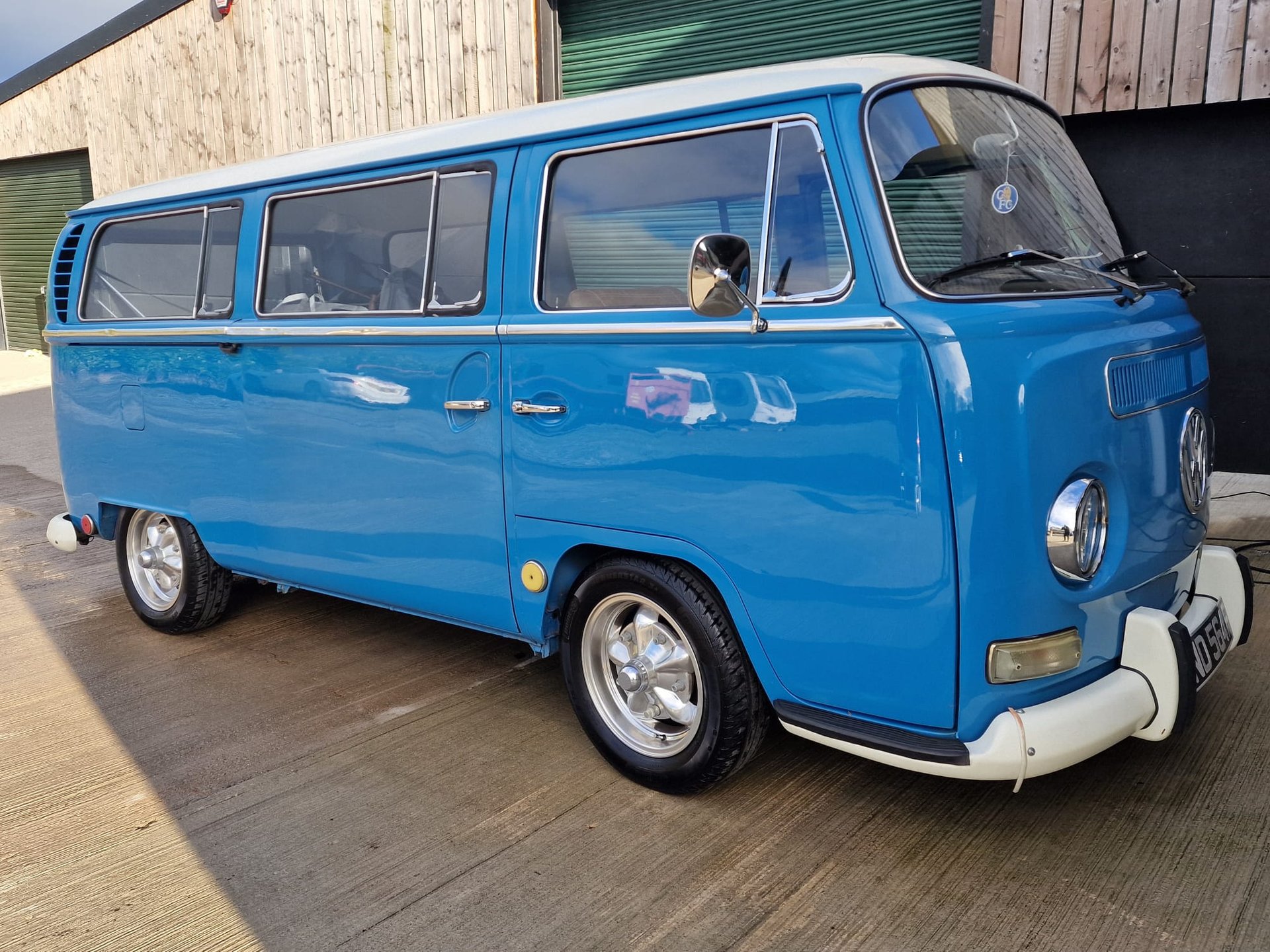 black and brown leather padded tub sofa