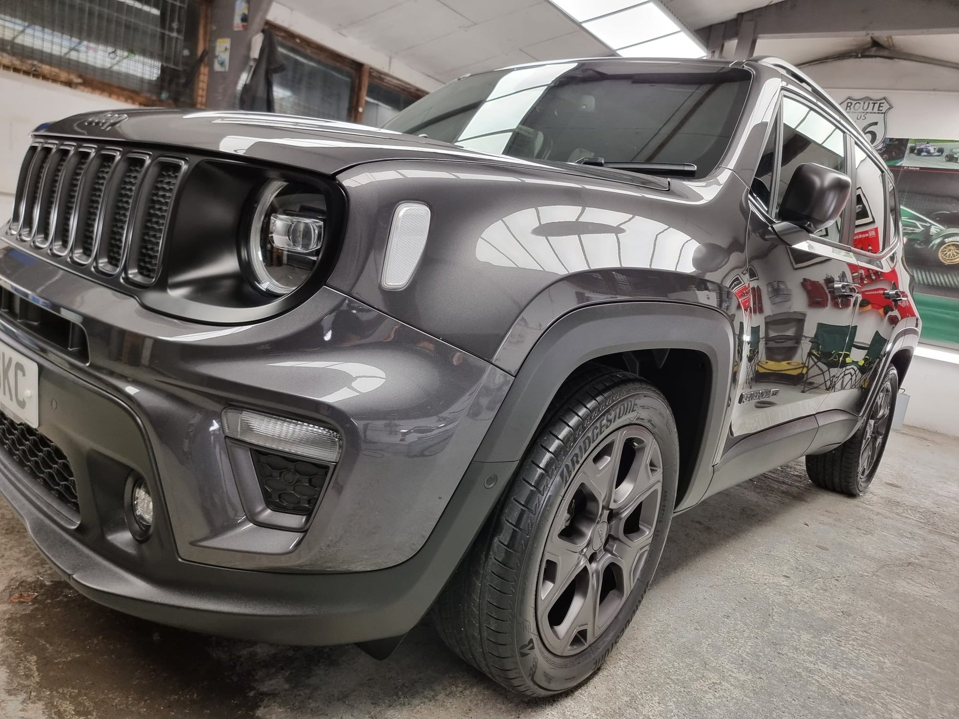 an abstract photo of a curved building with a blue sky in the background
